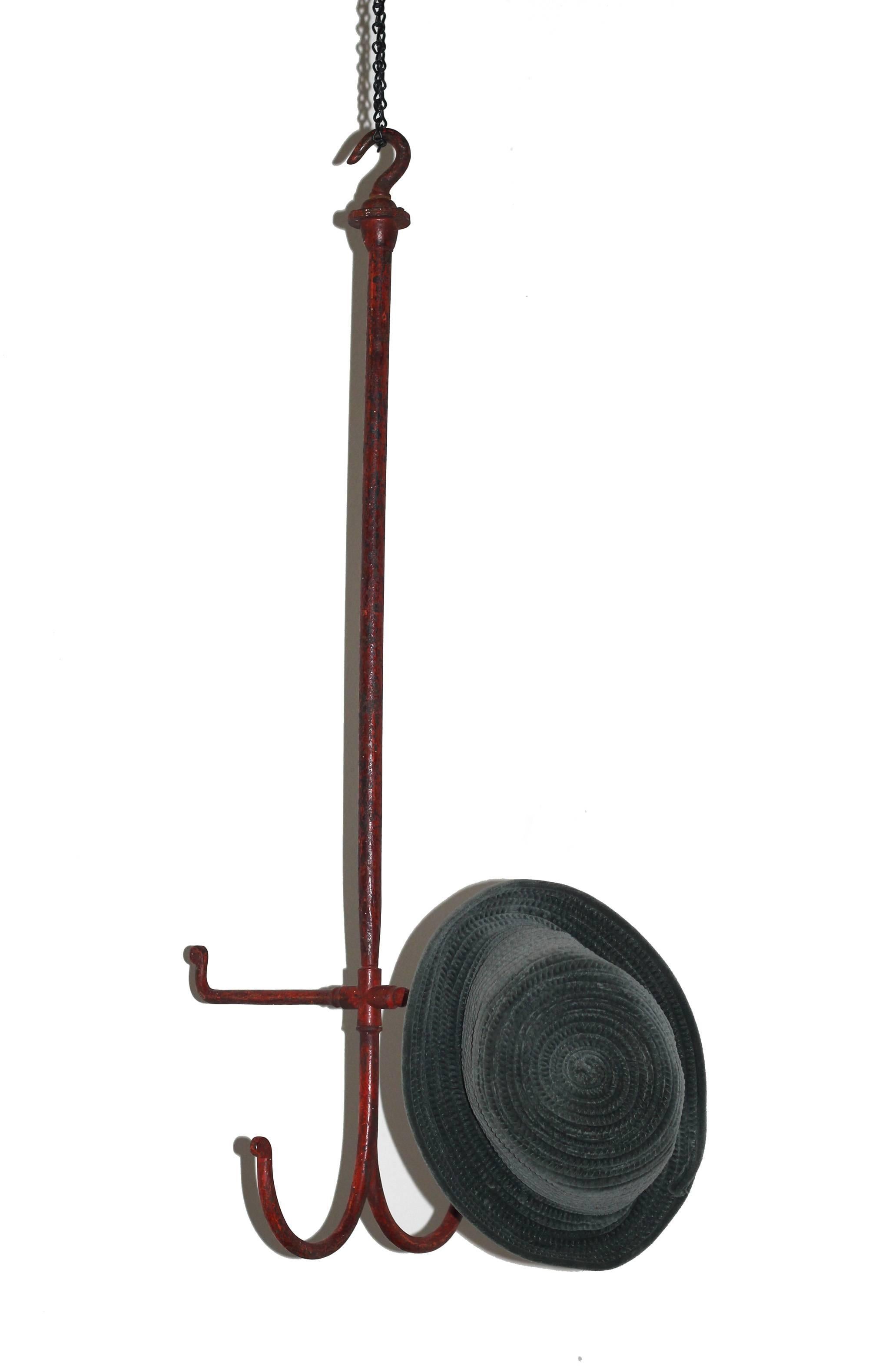 Great-looking, tall, very strong and versatile painted iron hanging hooks, originally a harness holder in a stable. Three dimensional and very well made. This would work well to hang a variety of things in a hallway, kitchen (heavy pots and pans) or