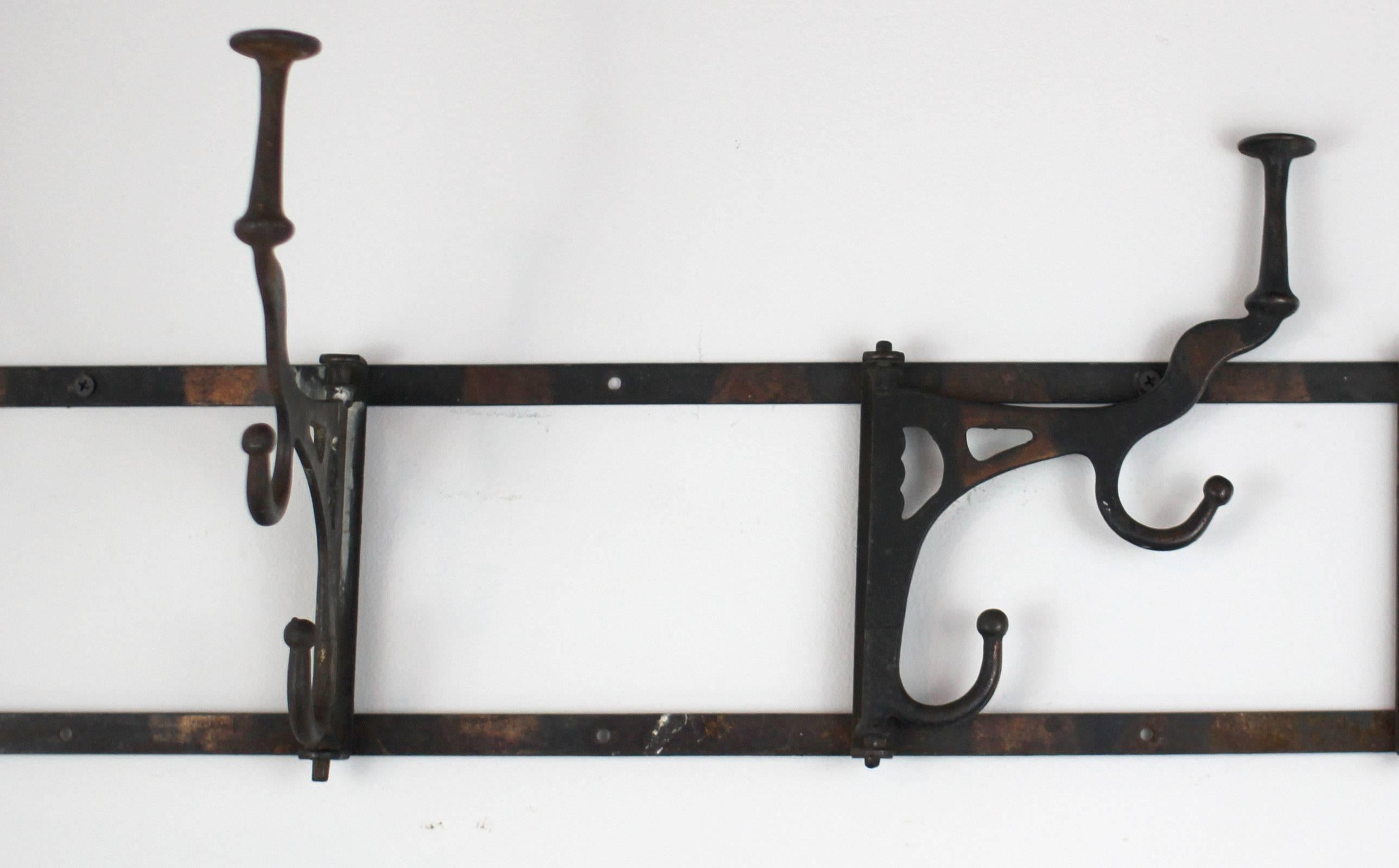 Industrial Iron Rack with Swing-Arm Hooks