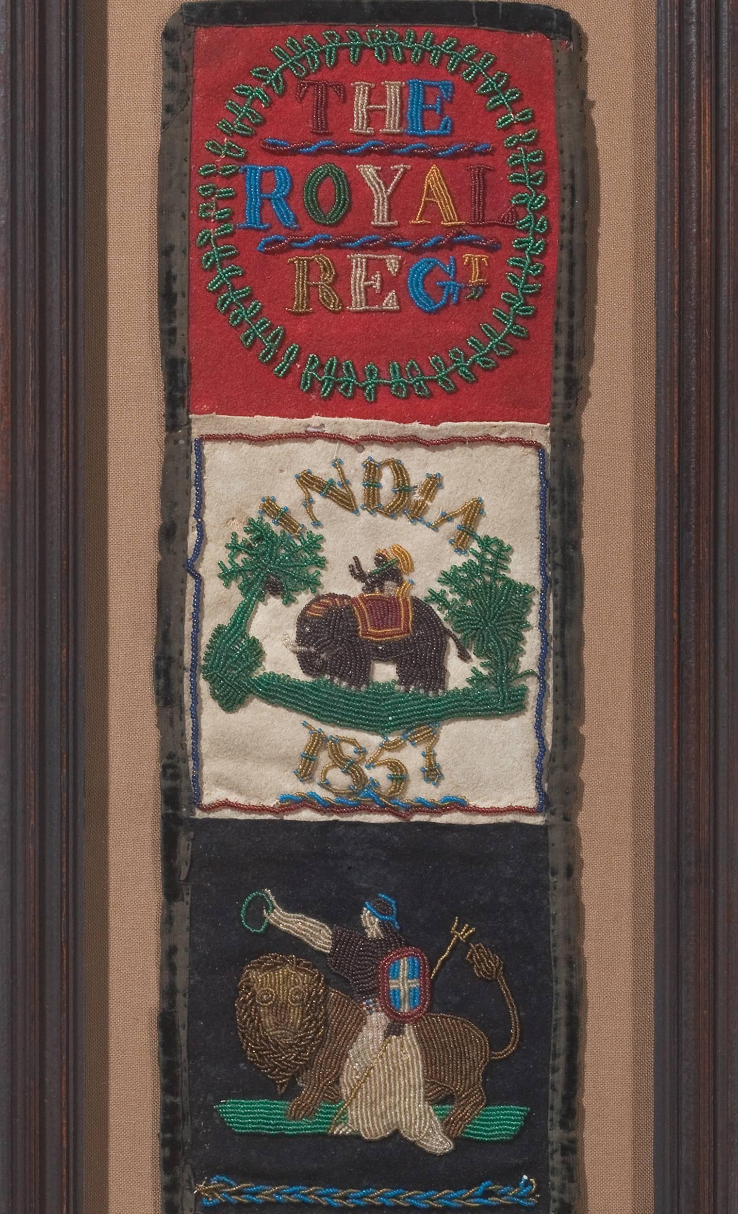 A highly unusual piece in that all of its work was accomplished in tiny glass beads stitched onto wool, this form is that of a hussif: a long, narrow textile comprised of several pockets that would hang or be folded, often serving as a keepsake