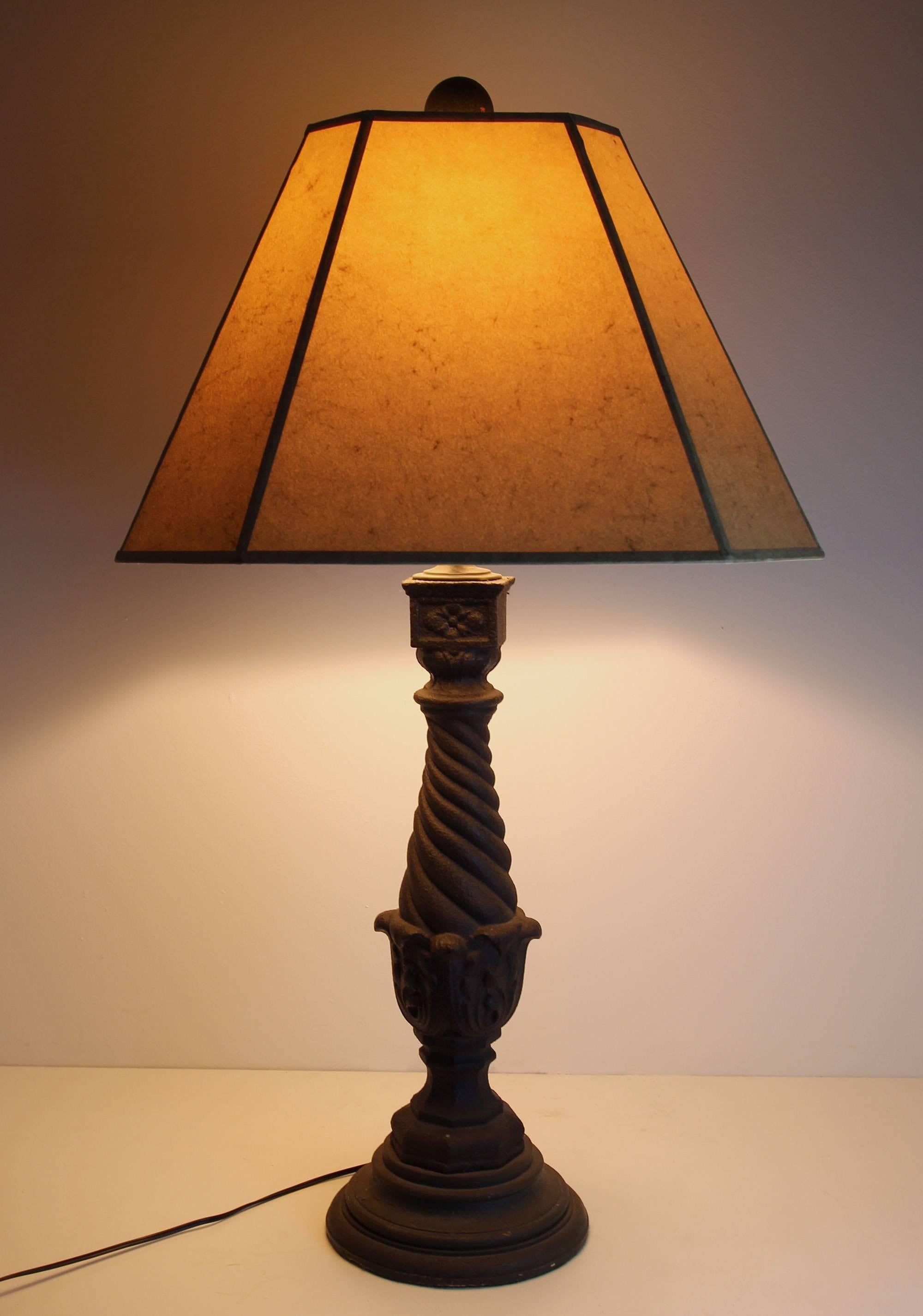 Heavy cast iron baluster lamp, new wiring (for three-way bulb) and hardware, new handmade parchment cut-corner shade and hand-painted finial iron baluster is probably American, circa 1900. Very good spiral and acanthus leaf design, excellent patina