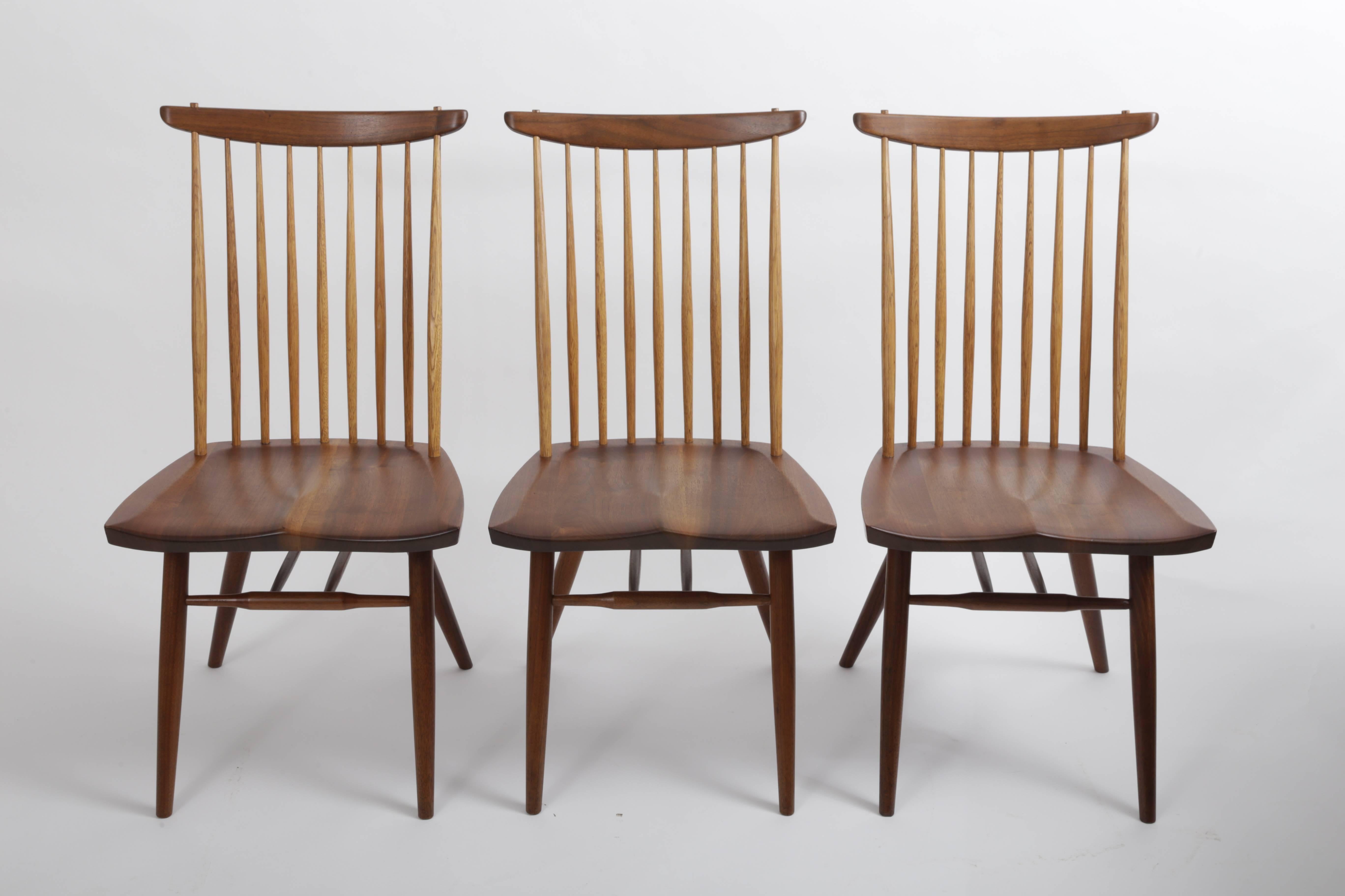 Walnut saddle seat having nine Hickory spindles.
Walnut top rail with tenon joinery.