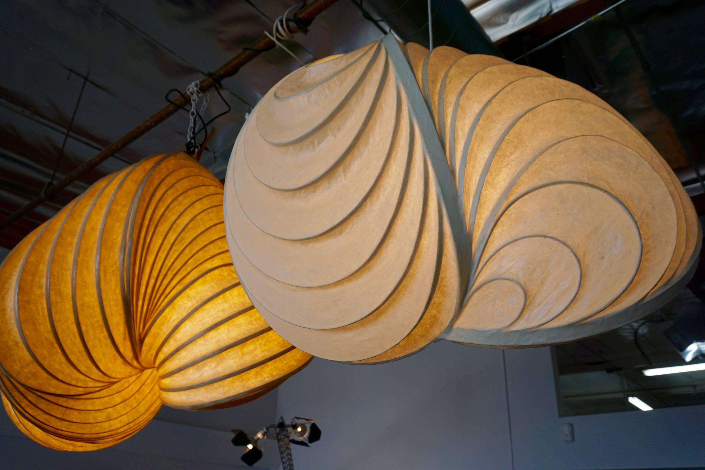 Stephen White created these one of a kind light sculptures with bentwood and a fiber resin technique to emulate rice paper.