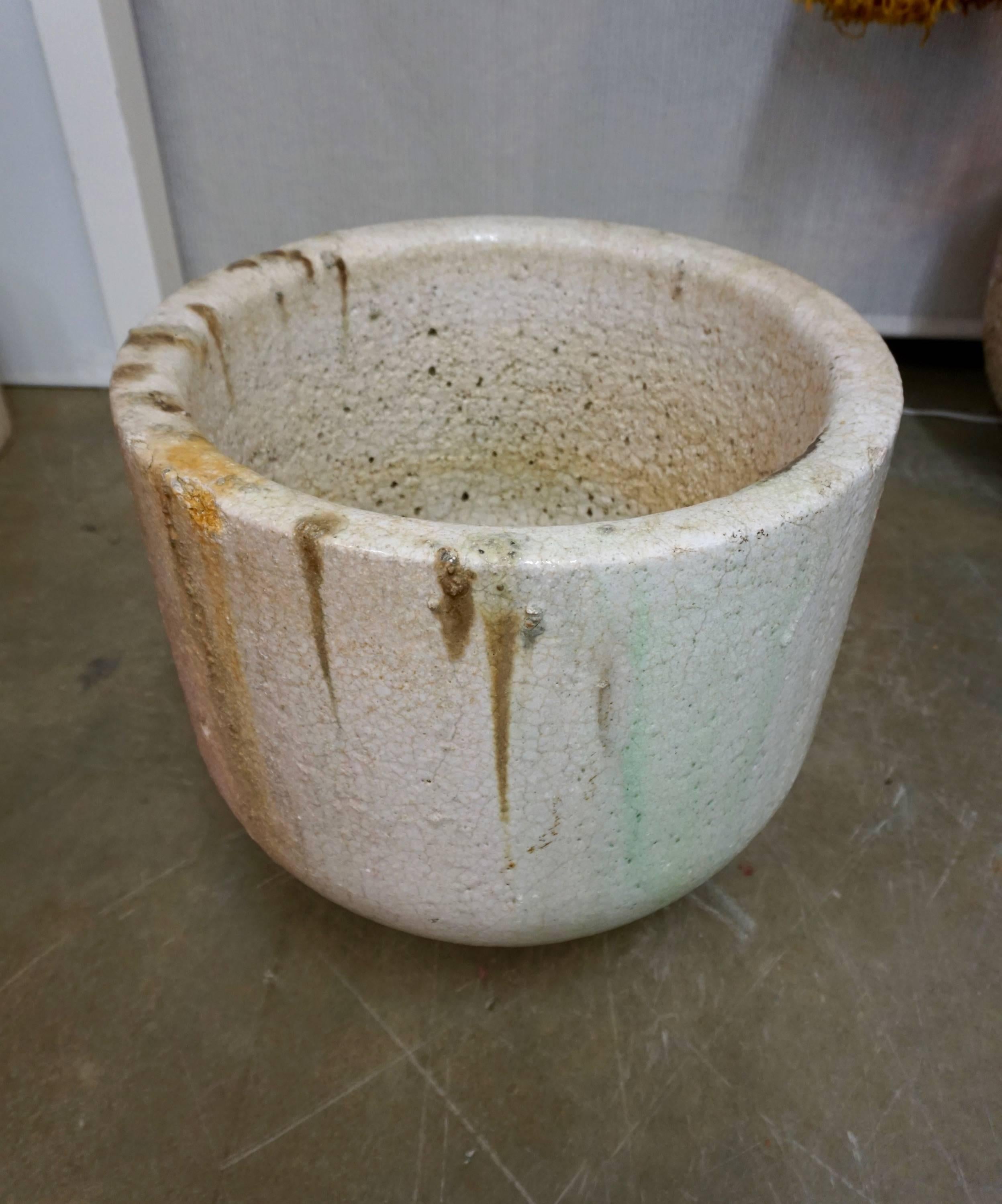 Ceramic vessel used by glaziers and glass blowers to melt glass at very high temperatures. Enhanced by the crackling, glass remnants and drippings. Can be used as a planter or decorative object, indoors or outdoors.
Multiple crucibles available.