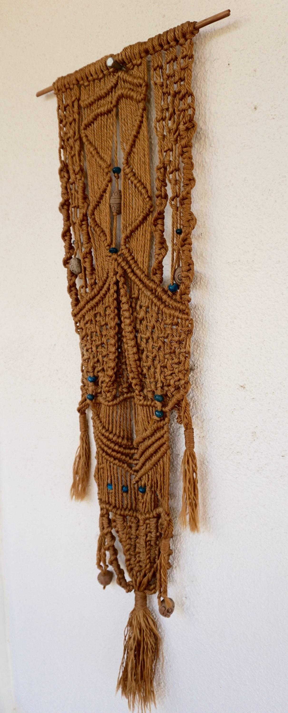 Excellent example of macrame made popular in the 1960s with beads incorporated into the piece.