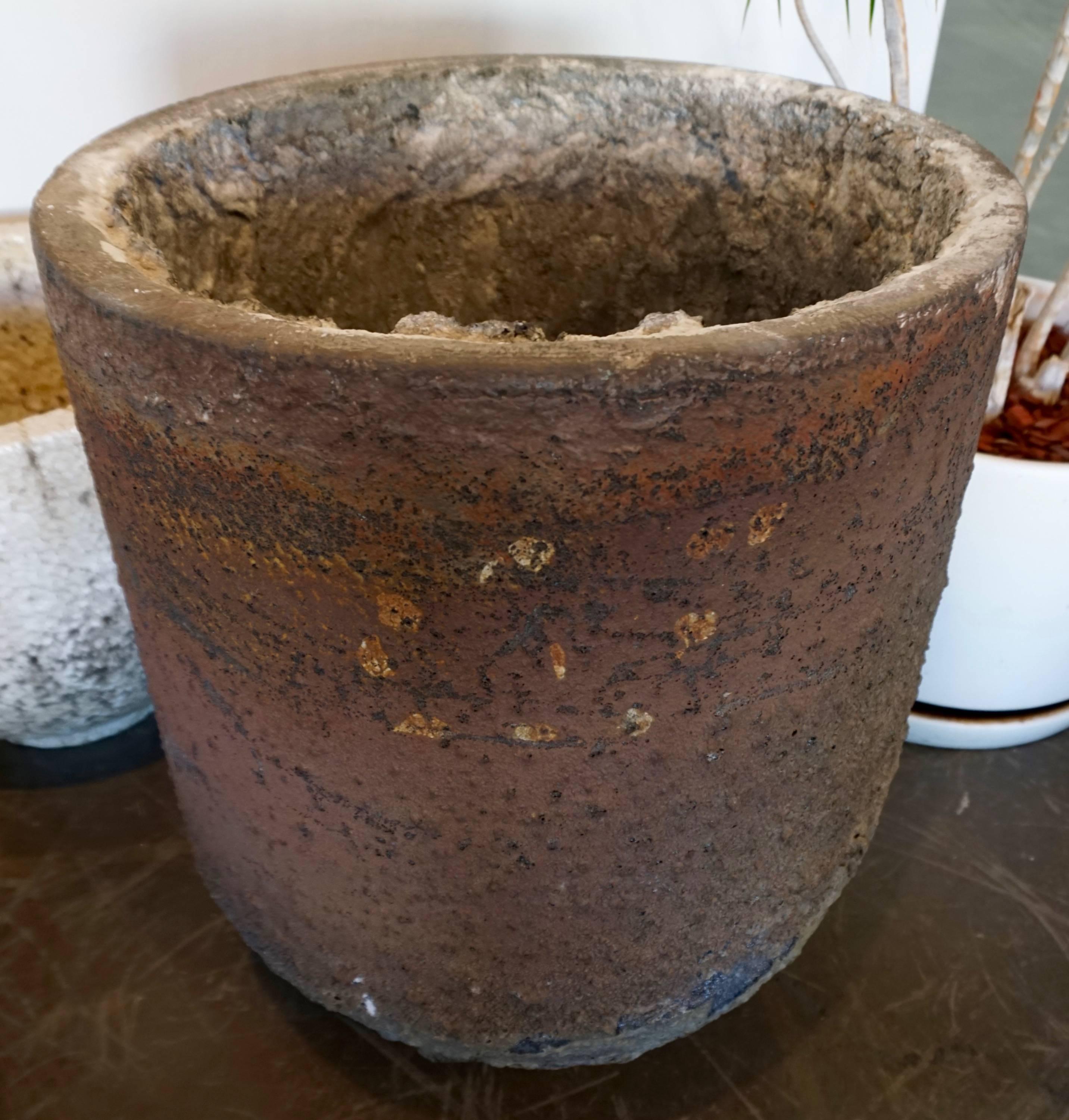 Large in scale and heavy. Used for melting iron ore at very high temperatures. Can be used as a planter or a decorative item, indoors or outside.
Nice patina.