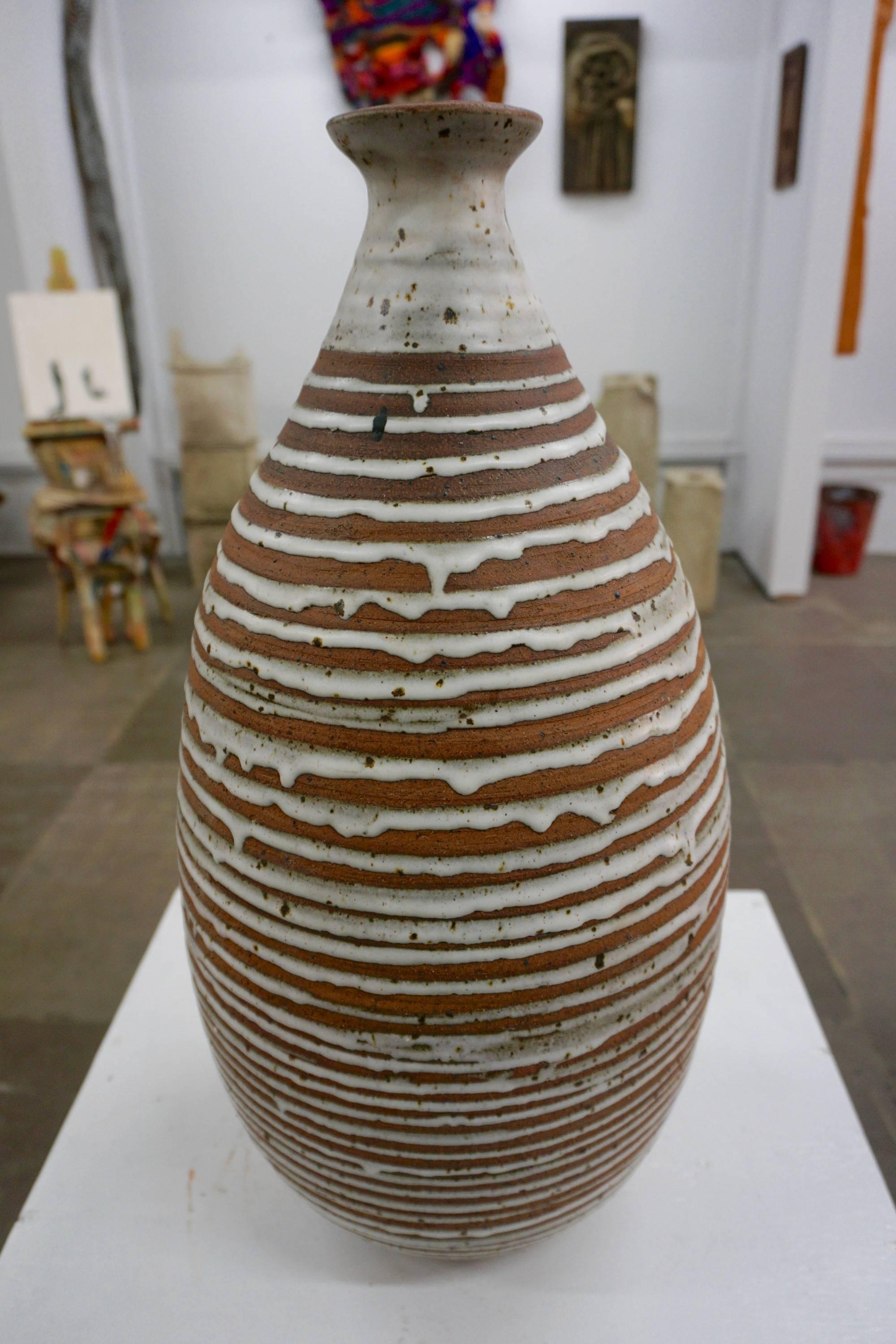 Tall Stoneware Vase with Drip Glaze 1