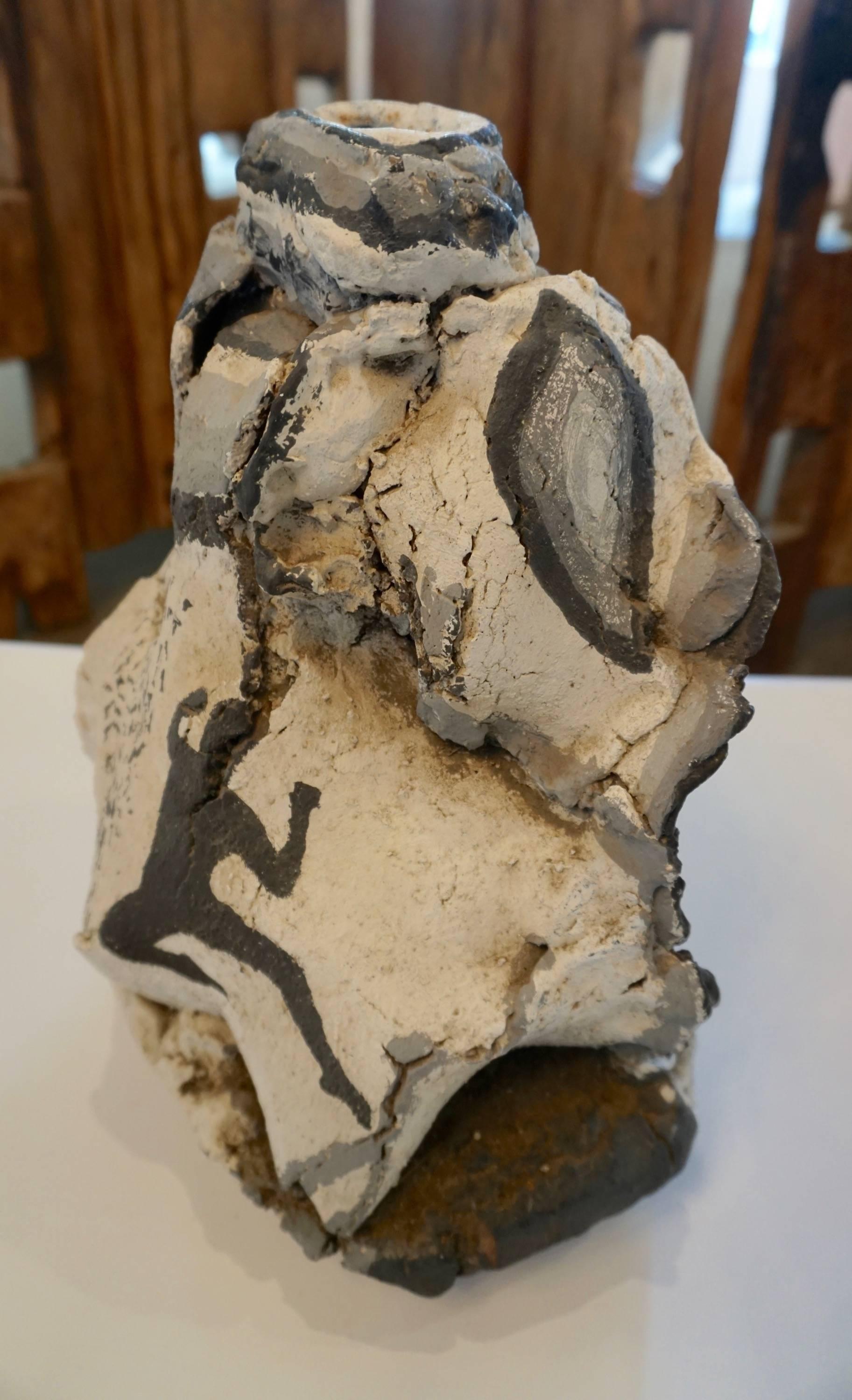 Interesting handcrafted vase, roughly layered. Shades of grey, black and white with image of a male dancer. Illegibly signed at the base.