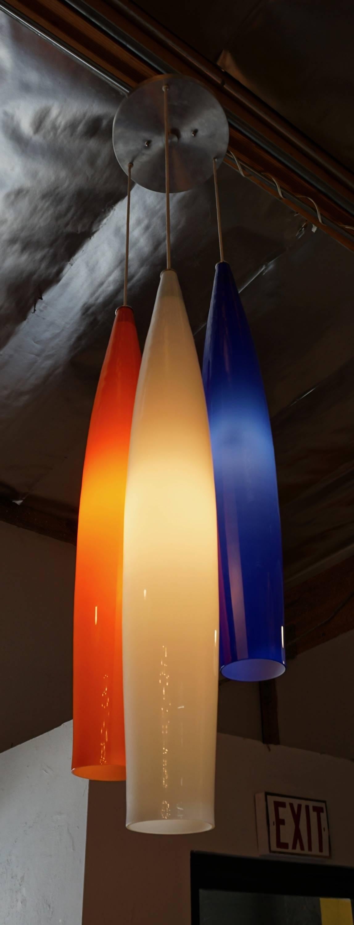 Tricolor handblown glass with opaline interiors by Gino Vistosi, Murano, Italy, mounted to a brushed stainless steel ceiling cap. Excellent condition with no chips or cracks.