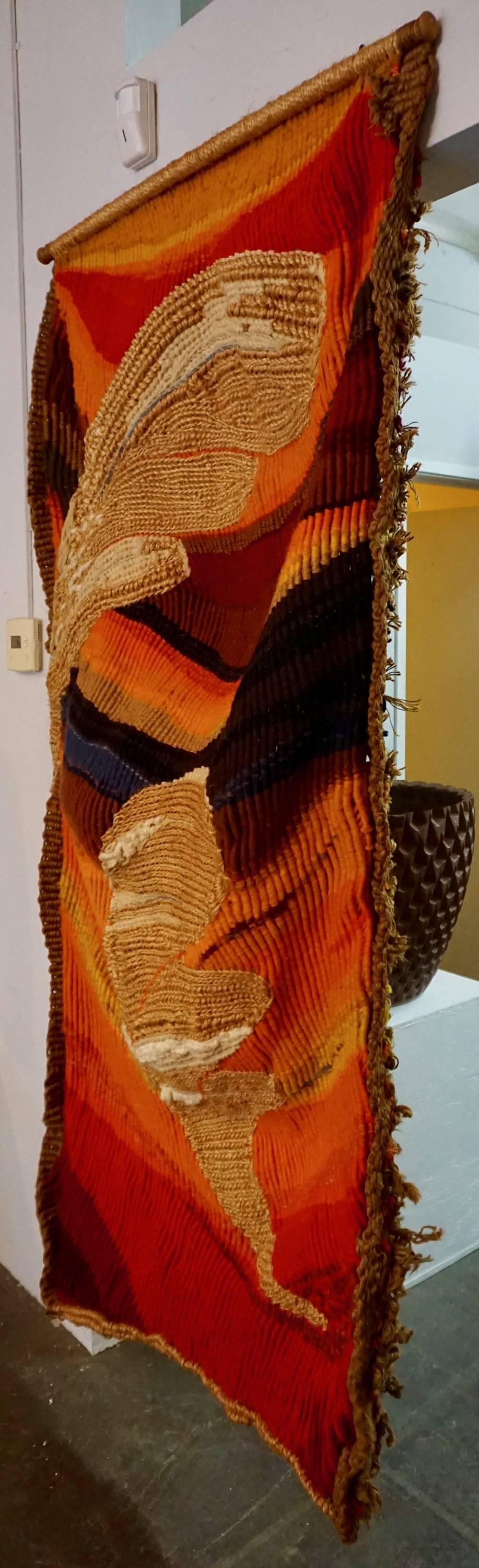 Organically constructed from twine, jute and dyed wool. Abstract design with some three dimensional effect.