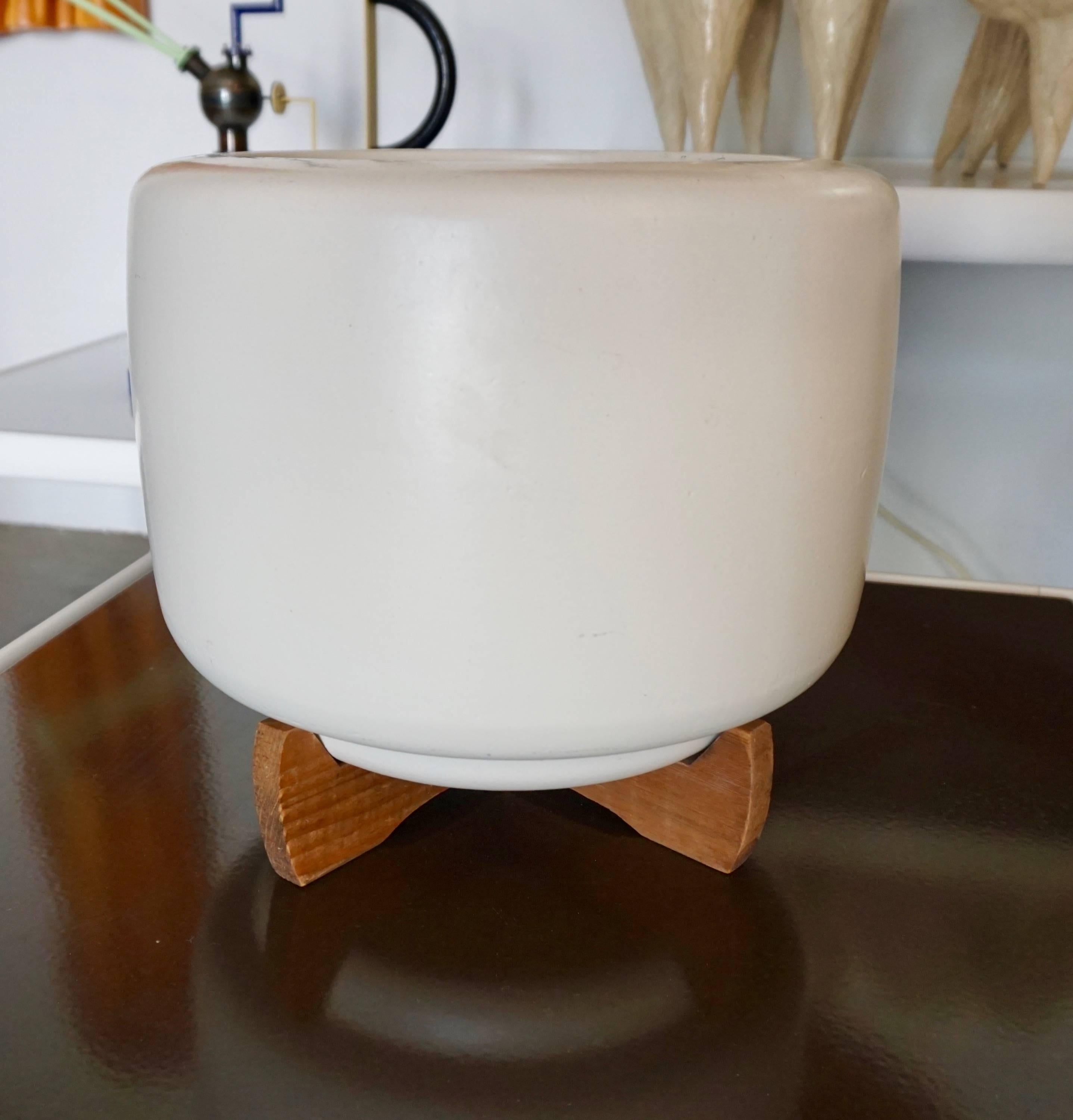 Designed by Rex Goode and John Follis for Architectural Pottery. Mounted on original redwood stands, drilled for drainage.

 