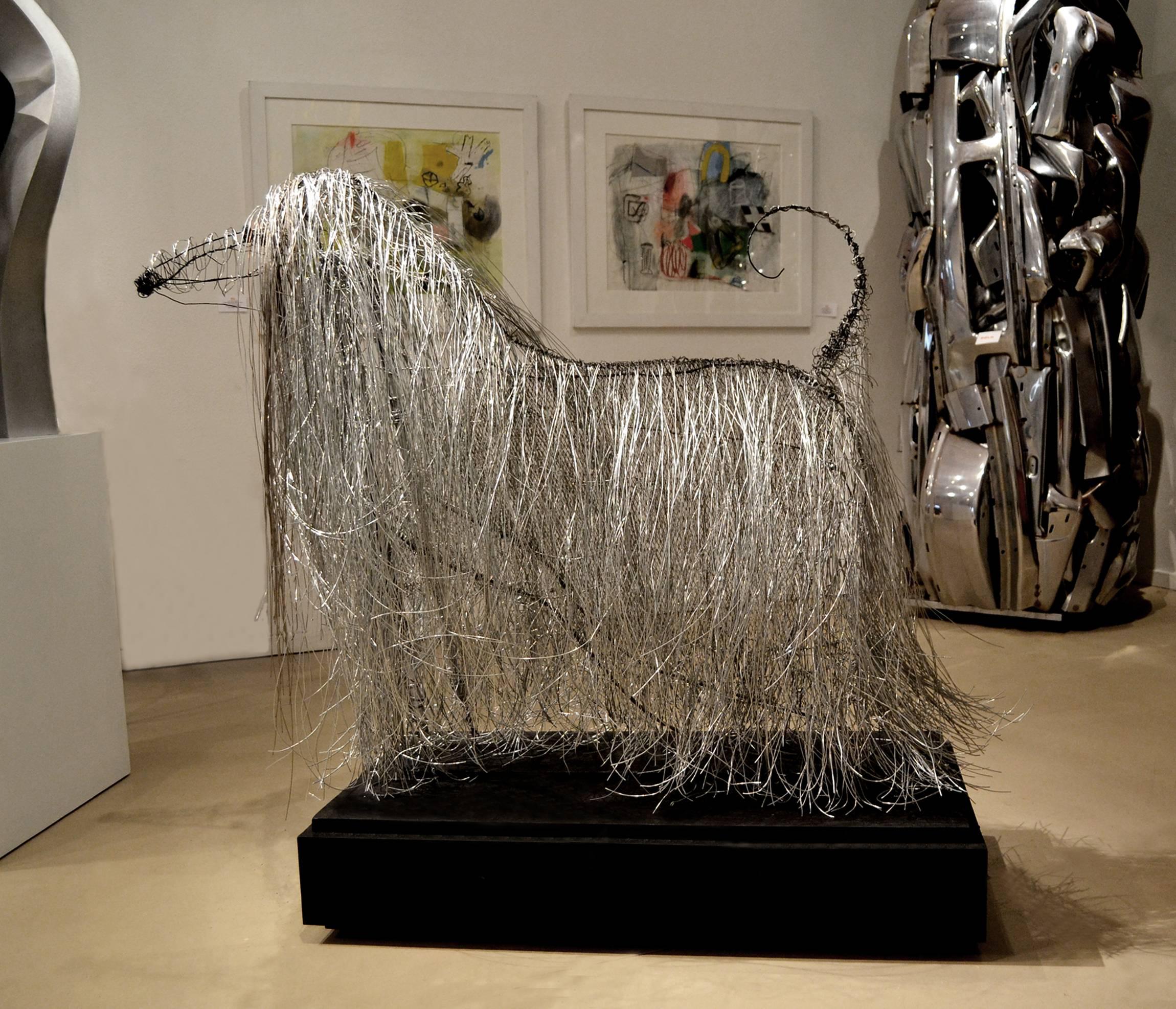 Artist Michael L. Jacques has been painting for many years and his works are part of public and private collections throughout the U.S. and Canada. Today, he continues to paint but is also a highly sought after sculptor. His fondness of dogs has led