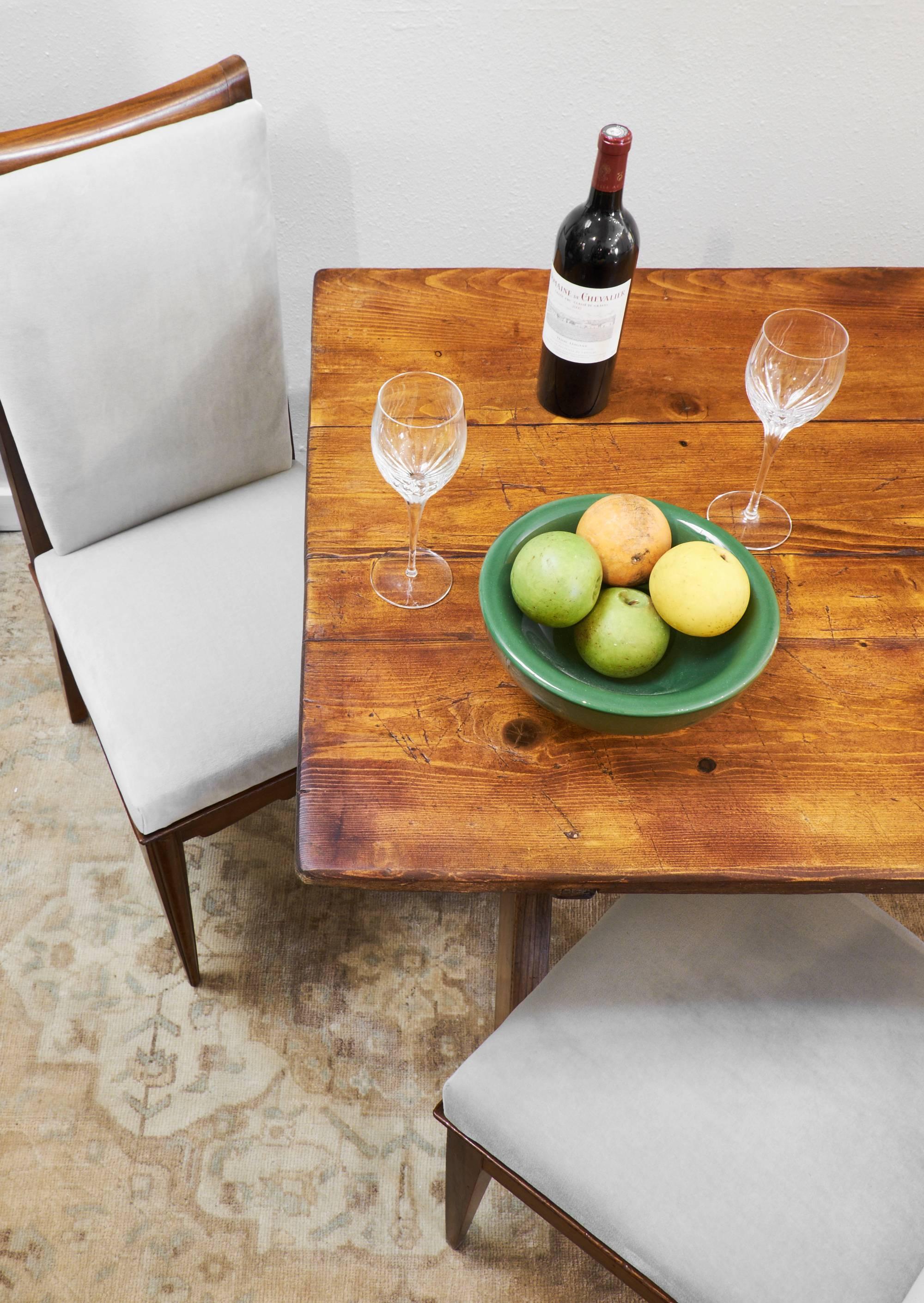 Elegant antique farm table from Tuscany of solid fir with a beeswax finish.
