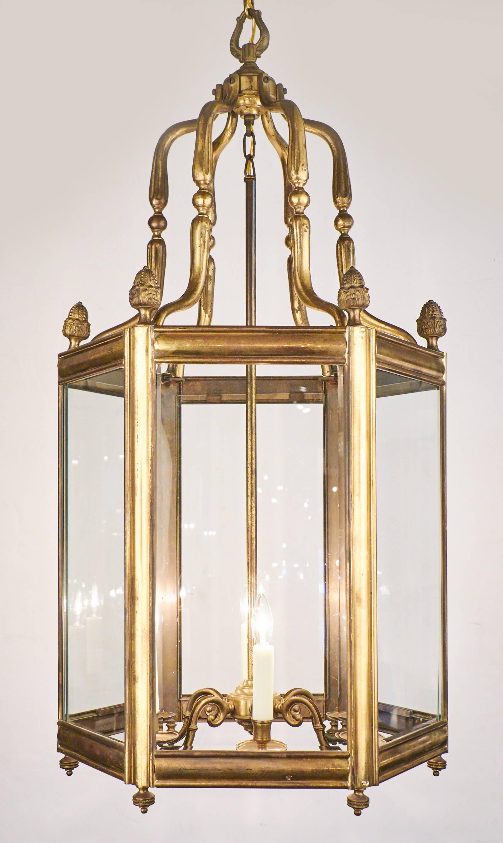 Superb large solid brass French lantern. Rewired to US standards with six candelabra sockets. Measures: Height to ceiling 71.75.