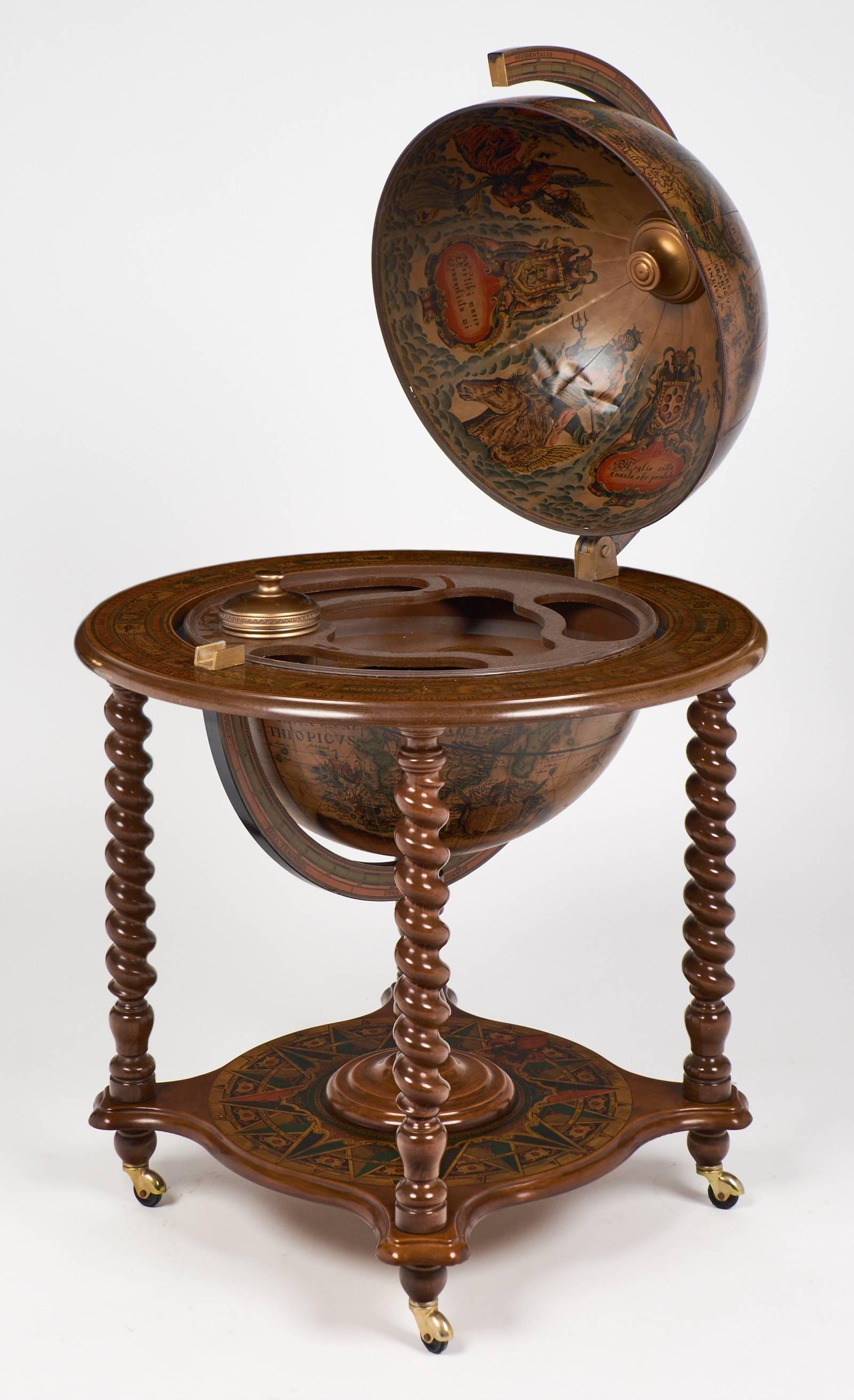 Mad Men era dry bar hidden inside a world globe, beautifully crafted with exquisite detail inside and out. The interior is compartmentalized to hold all your bar ware, and includes an insulated bottle holder. Exterior shows a 17th century world