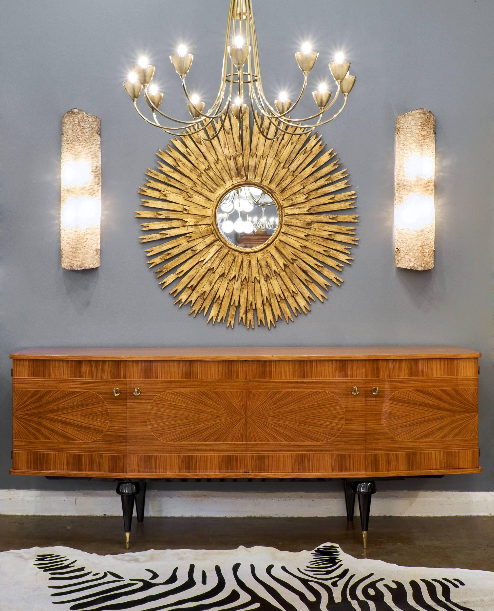 Spanish vintage pair of large gold leaf sunburst mirrors with three layers of rays surrounding original round mirrors. A spectacular size for a maximum decorative impact.