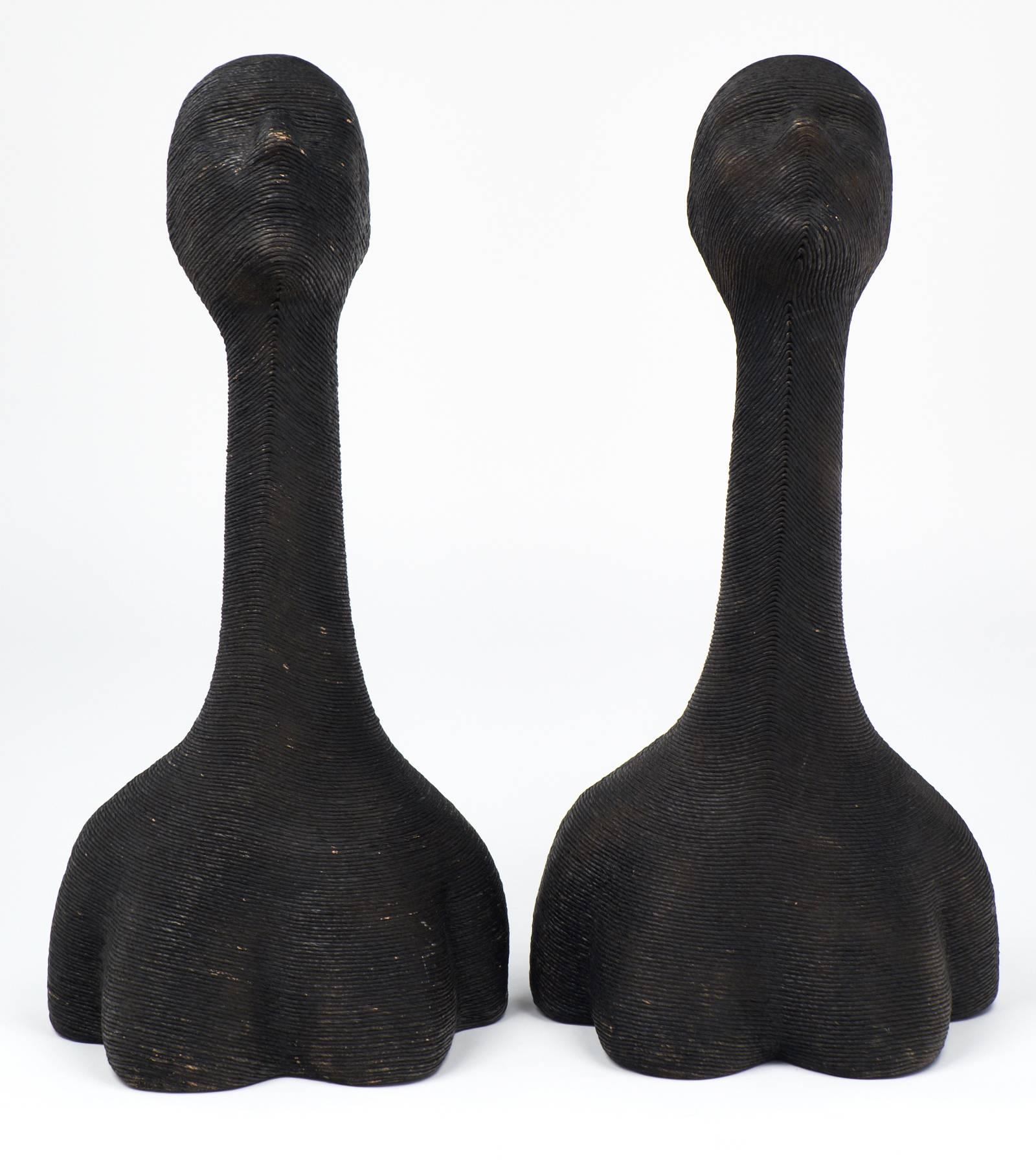 Vintage pair of French hat mannequins, very elegant with long necks, wrapped in black raffia for an intriguing texture on these interesting conversation pieces.