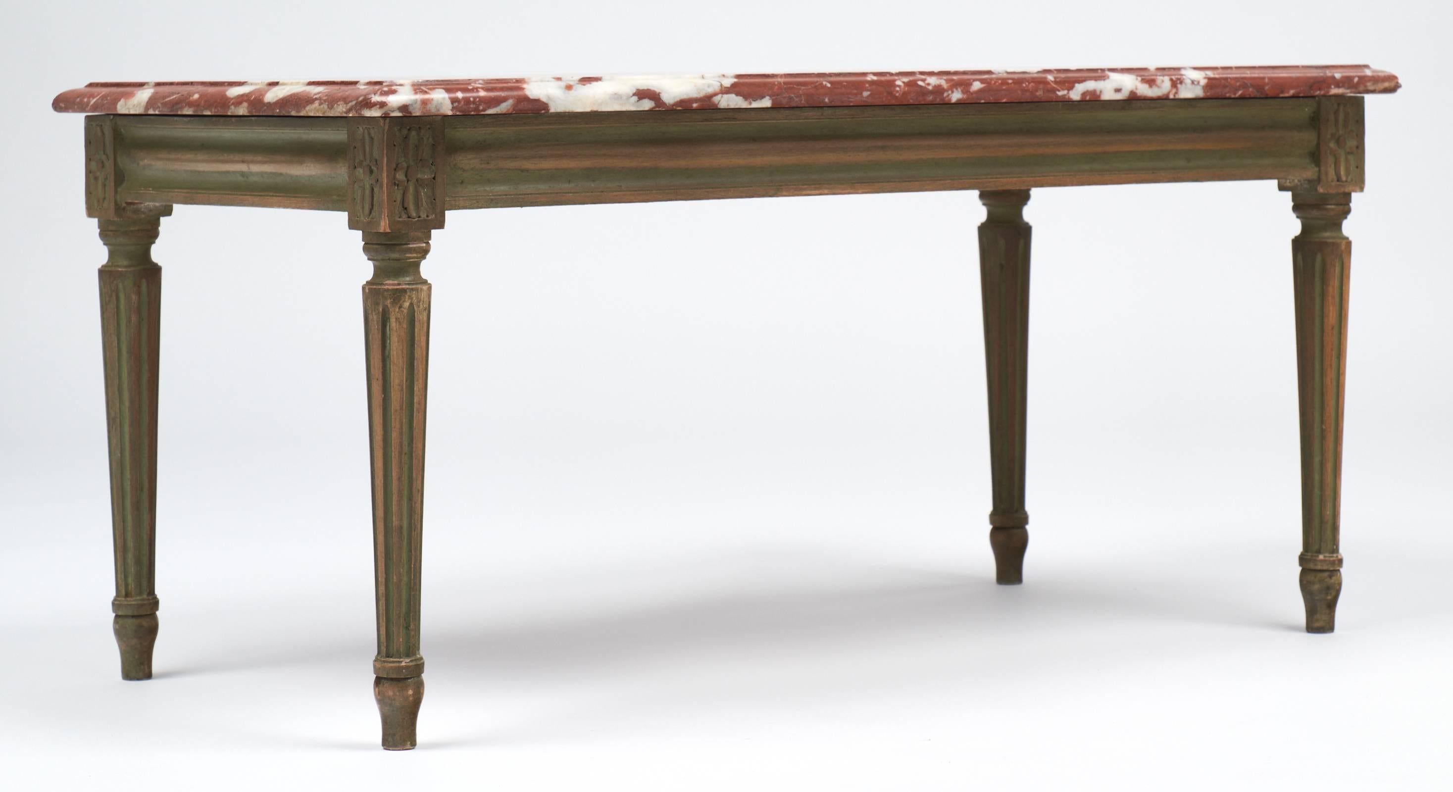 Great antique coffee table with carved and painted beech wood base and topped with rare 