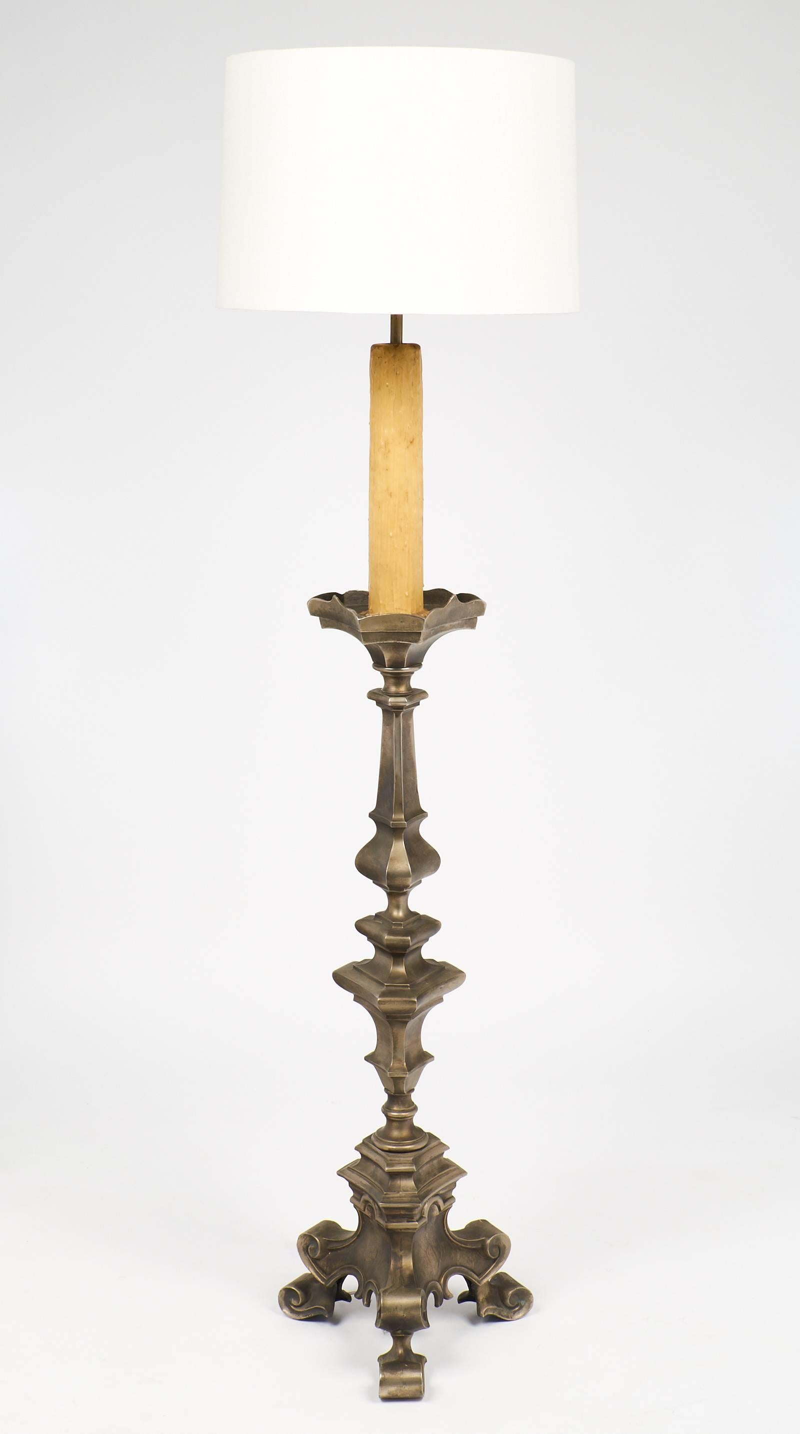 This nickeled, Neo-Renaissance solid brass floor lamp features a faux candlestick and an ornate Neo-Renaissance metal work. This piece has been rewired for the US.
