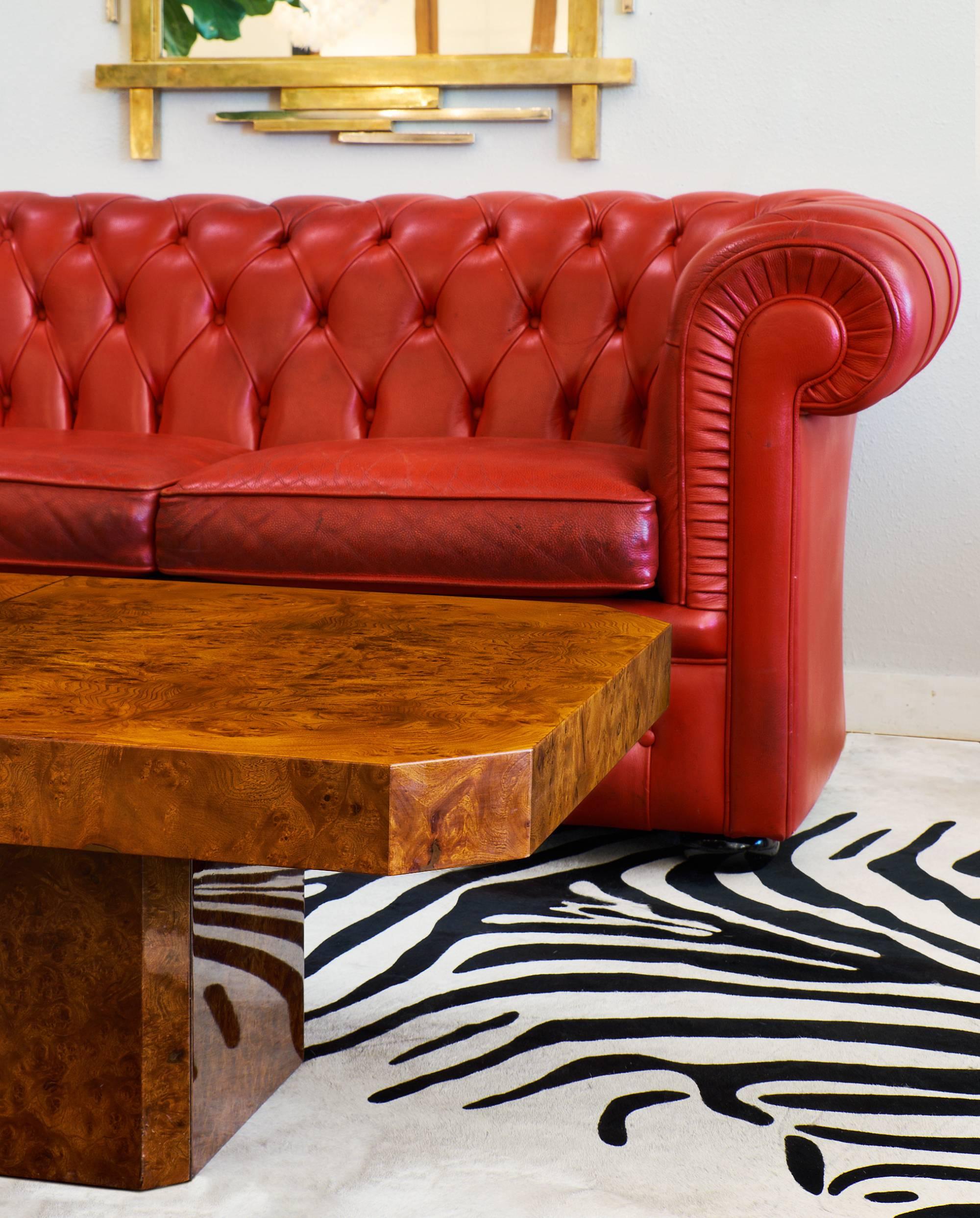 Crimson red Chesterfield in fantastic condition! This piece is very comfortable and bold, ready to steal the show in any living space. This is a unique and wonderful sofa.

 