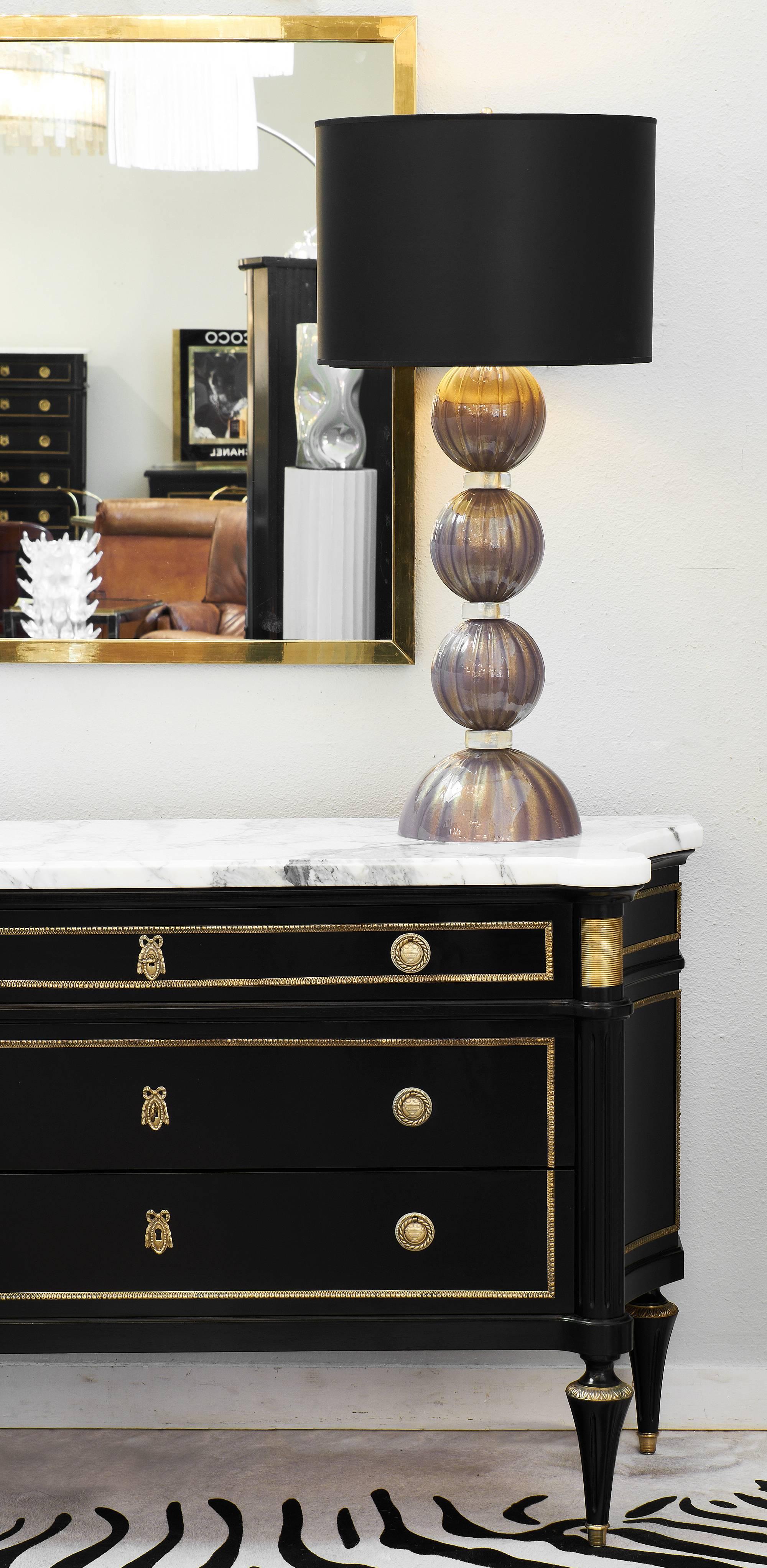 Wonderful antique French Louis XVI style chest of drawers made of mahogany that has been ebonized and finished with a museum quality French polish for a lovely luster. This piece has finely cast bronze hardware and gilt brass trim, the original