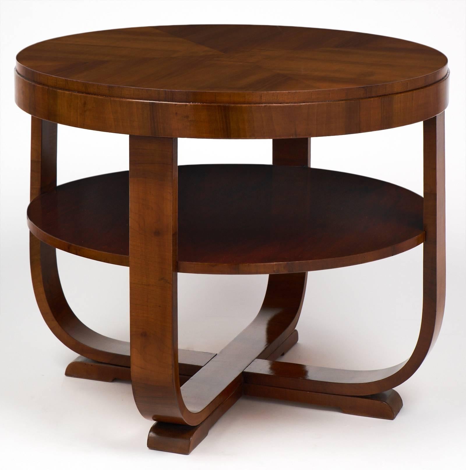 Wonderful Biedermeier Austrian Art Deco gueridon from a hotel in Vienna, circa 1940. This lovely table has four legs, a shelf, and a walnut veneer parquetry top. The finish is a lustrous French polish. We love the deep luster of the piece and the