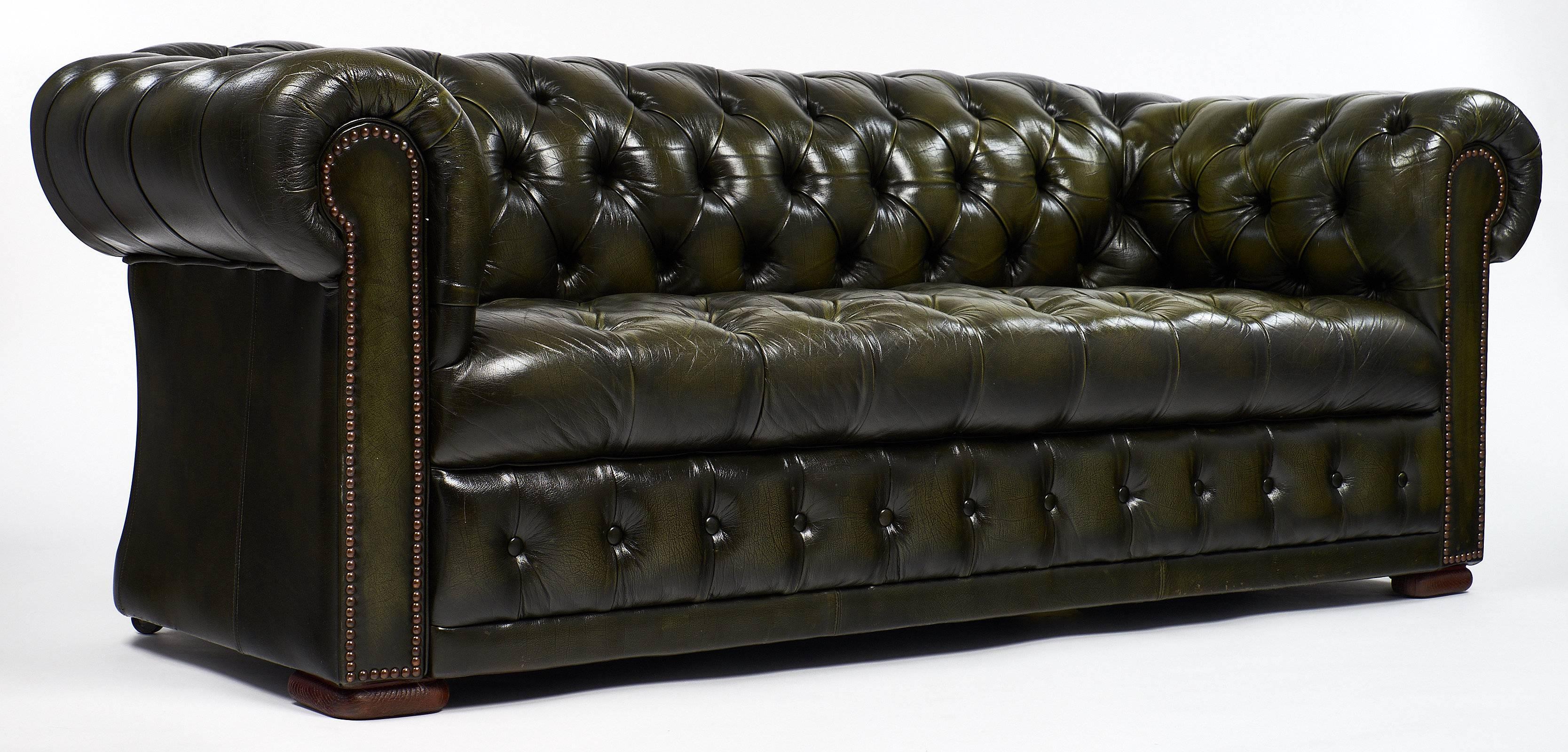 green leather chesterfield sofa