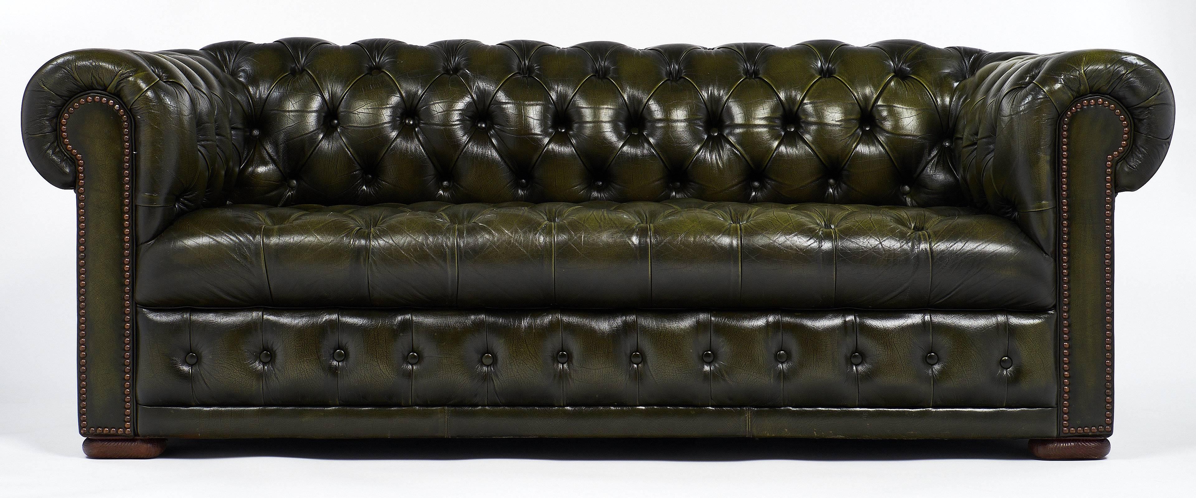 green leather chesterfield couch