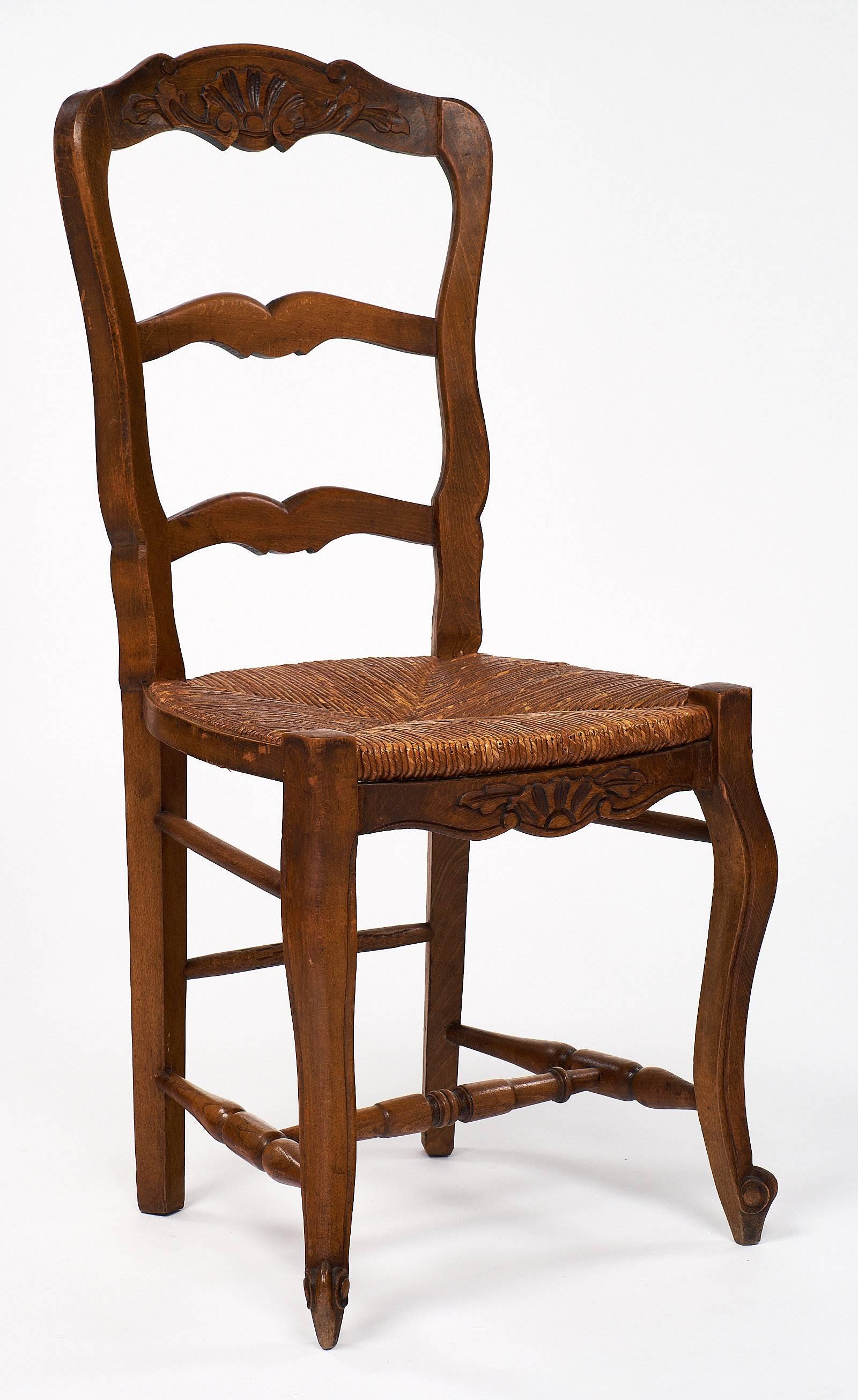 antique wooden chairs with wicker seats