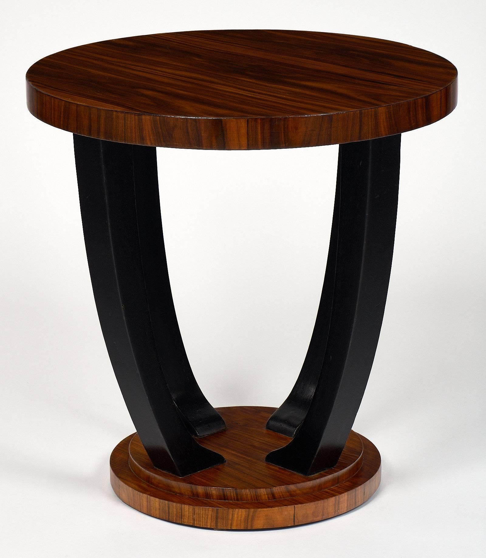 Striking French Art Deco period gueridon side table in rosewood and ebonized wood base with French polish.