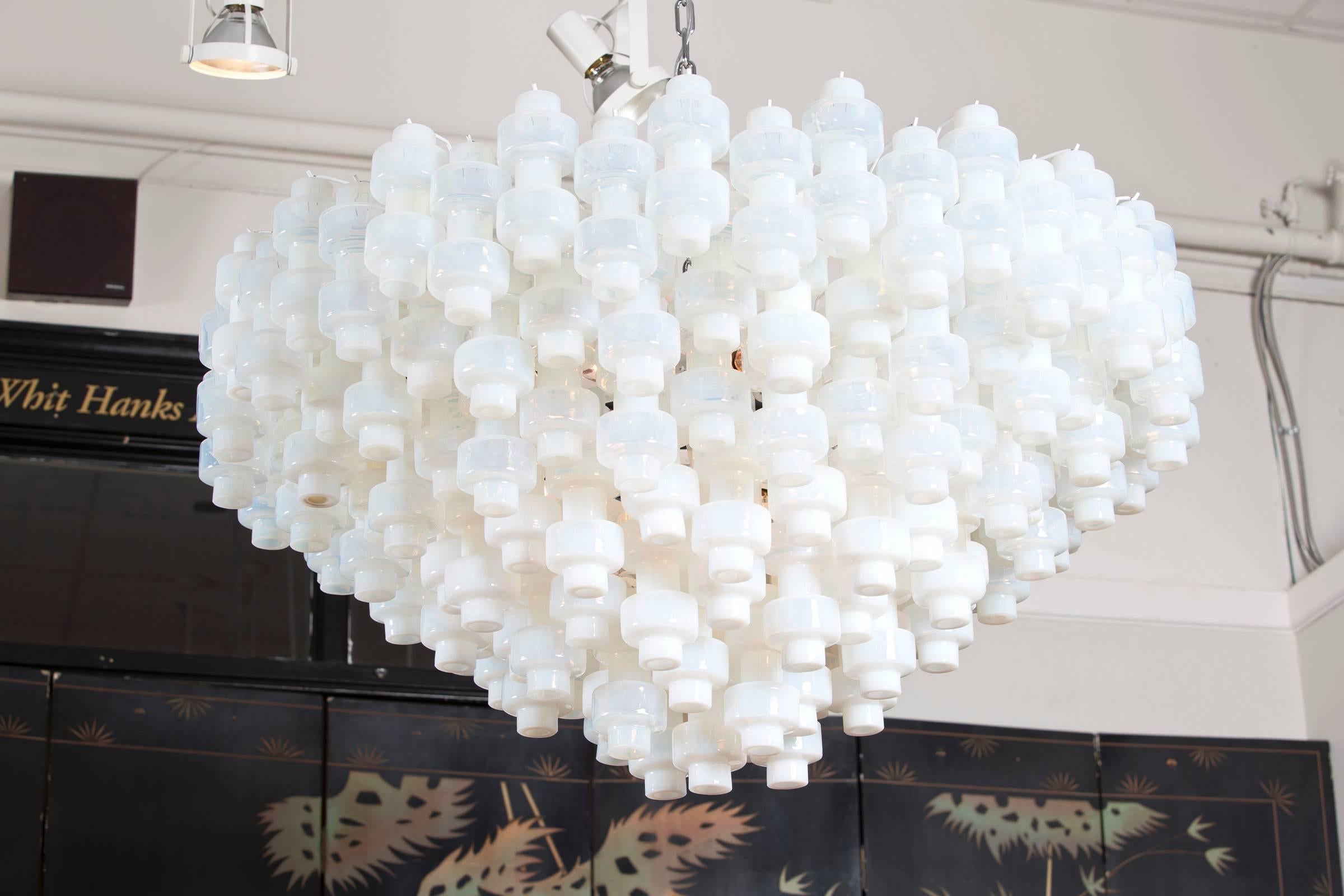 A stunning Murano glass chandelier with six tiers of unique 