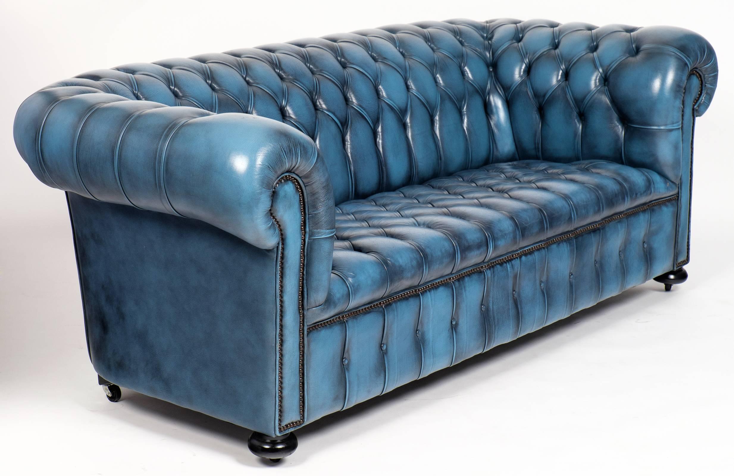 blue tufted leather sofa