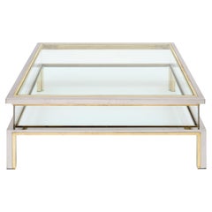 Table basse signée Romeo Rega, style moderniste, chrome et laiton, vers 1960