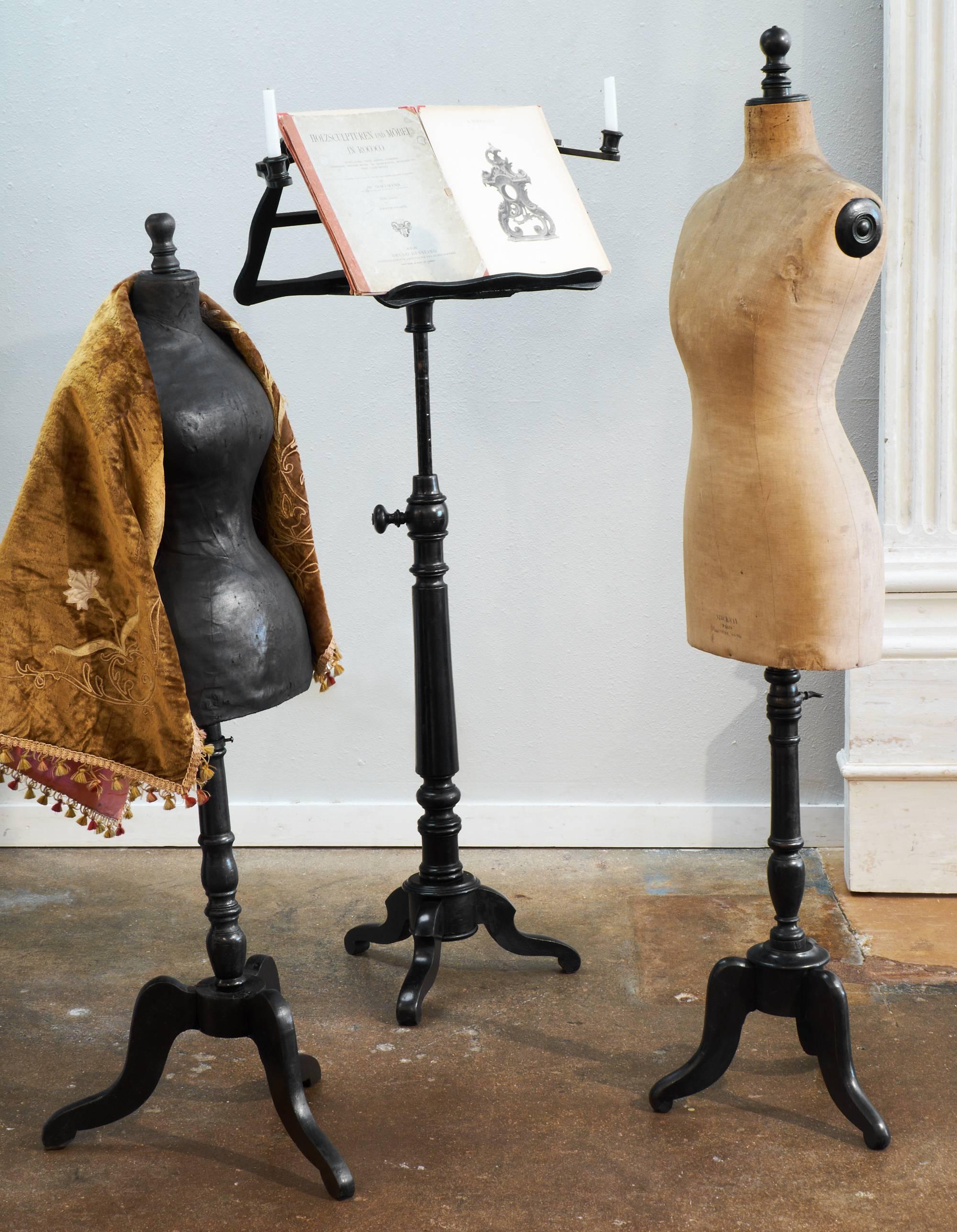 Originally used by Parisian tailors and dressmakers for draping, alterations, and creating the latest French fashions, these vintage dressmaker mannequins are also a great piece of decor. These adjustable height dress forms have ebonized and French