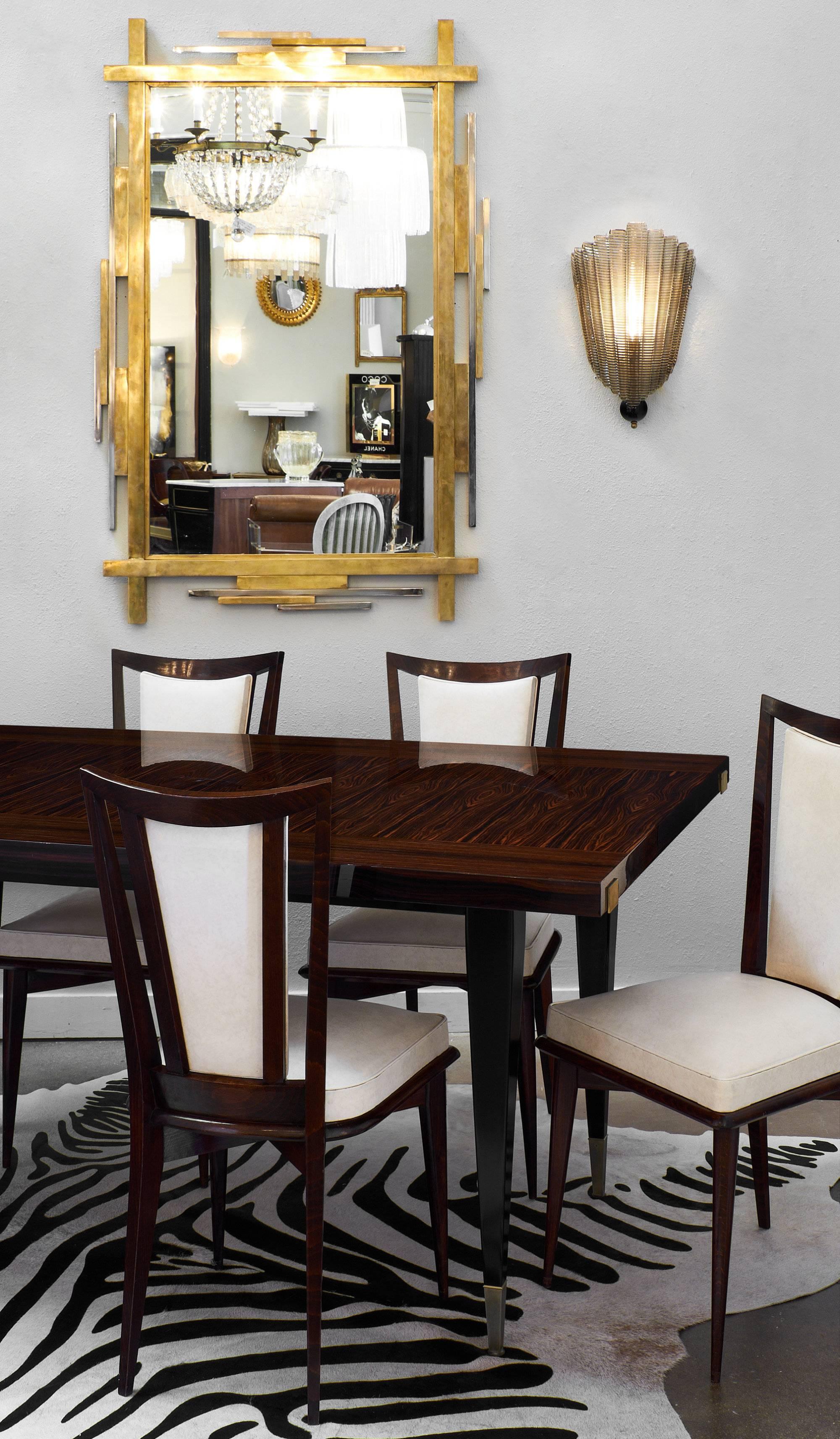 Mid-Century Modern French dining chairs with elegant rosewood frames and the original vinyl upholstery. These chairs are very comfortable and have beautiful clean lines, making them perfect for your dining room!

 