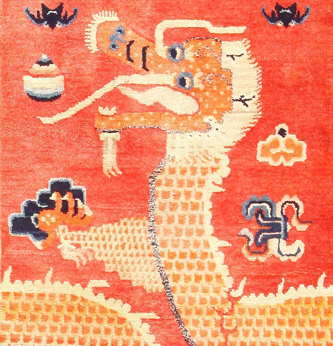Beautiful antique dragon design Chinese Ningxia runner rug, country of origin: China, circa date: 1900. Though simple in its presence, this attractive Chinese rug relies on Stark and bright colors to set the scene. Vibrant, almost vermilion red