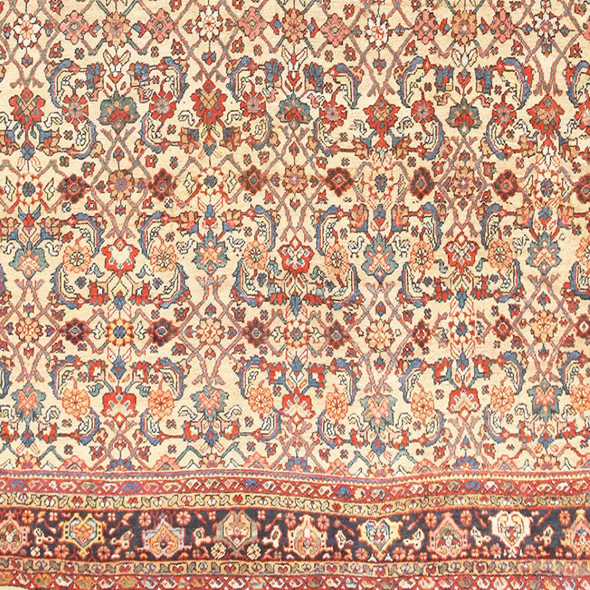 Beautiful Camel Colored Background Room Size Antique Persian Sultanabad Rug, Country of Origin / Rug Type: Persian Rug, Date: Circa 1910. Size: 10 ft 4 in x 12 ft 9 in (3.15 m x 3.89 m)

With an incredible collection of details assembled to