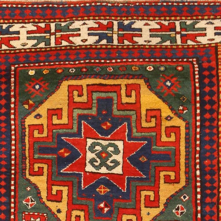 Exceptional Dark Green Kazak Rug at 1stDibs