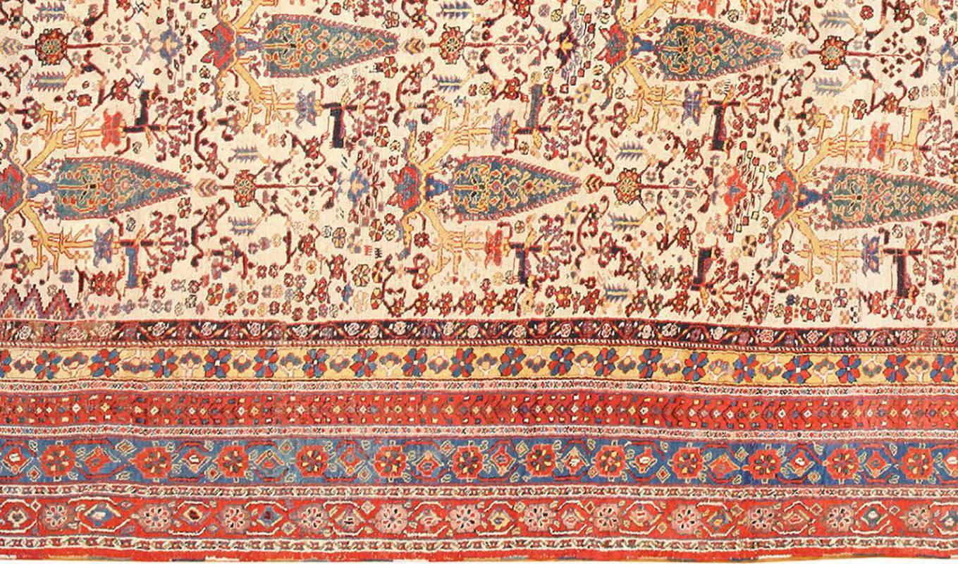 Rare and Beautiful Large Oversized Antique Persian Tribal Qashqai Rug, Country Of Origin / Rug Type: Persian Rugs, Circa Date: 1900. Size: 12 ft 8 in x 24 ft (3.86 m x 7.32 m)

An extravagant forest fills the cream central field of this antique