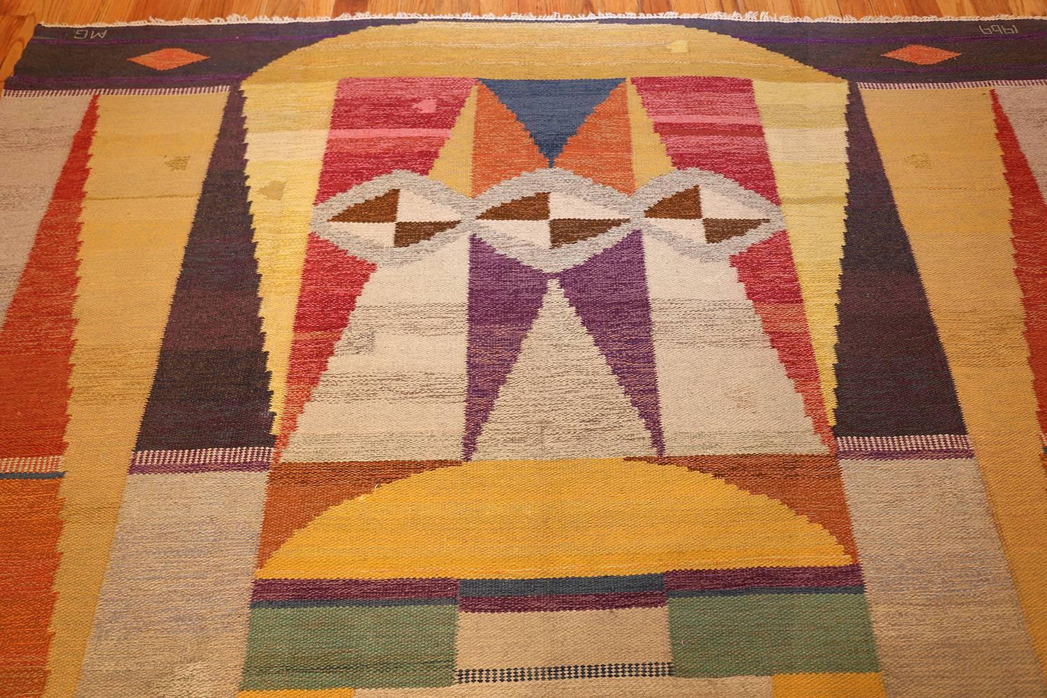 Beautiful and colorful Scandinavian Swedish Kilim rug dated 1969 Signed MG 49267, country of origin / rug type: Scandinavian rug, Date: circa 1969.

Scandinavian rugs – Scandinavia is known for their Rya and Rollakan Scandinavian rugs. Named after