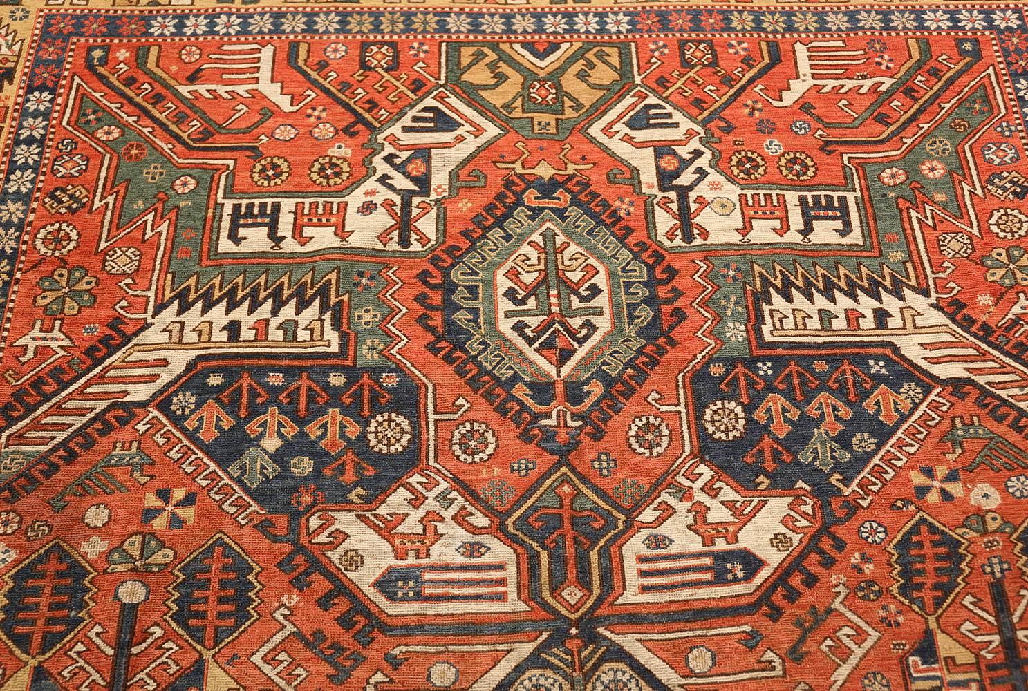 20th Century Antique Red Background Soumak Caucasian Rug. Size: 5 ft 9 in x 10 ft 2 in 