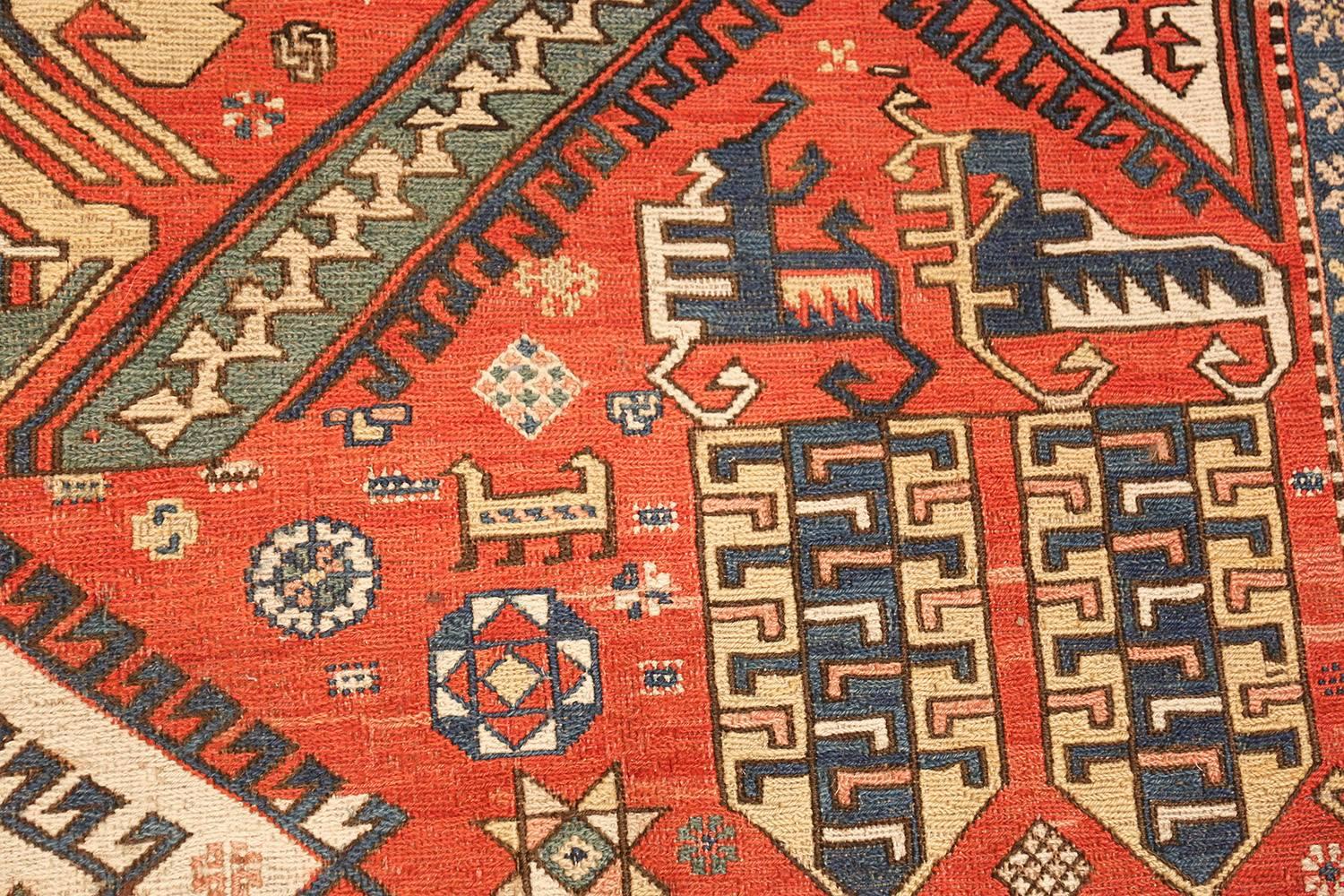 Wool Antique Red Background Soumak Caucasian Rug. Size: 5 ft 9 in x 10 ft 2 in 