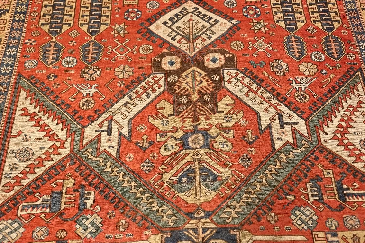 Antique Red Background Soumak Caucasian Rug. Size: 5 ft 9 in x 10 ft 2 in  1