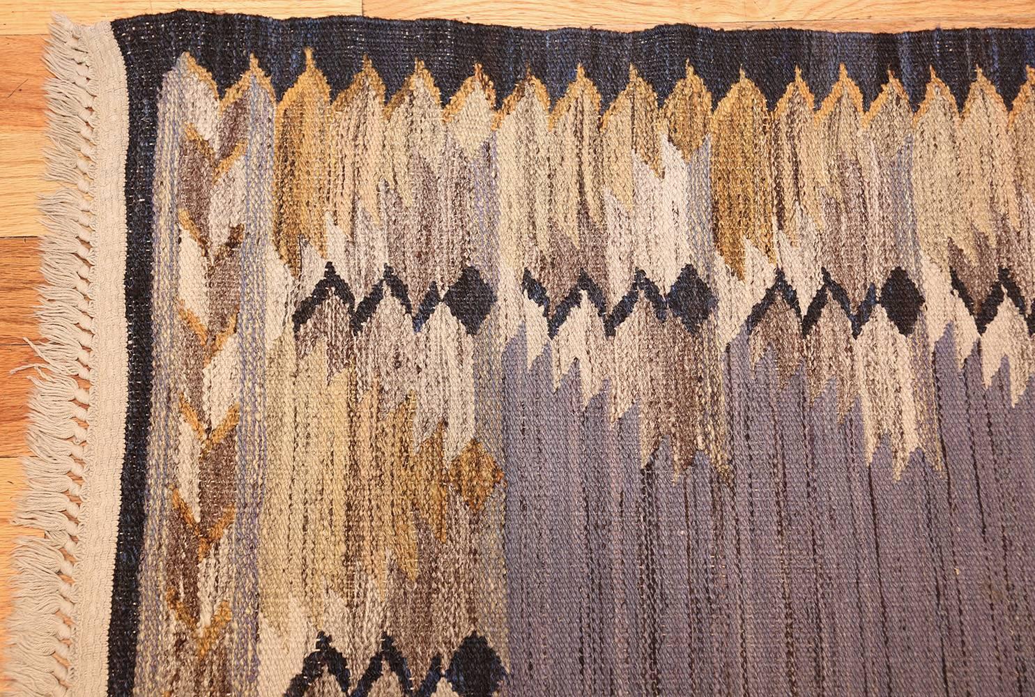 A unique and intriguing example, this Mid-Century Swedish Kilim boasts a compelling design that beautifully brings together a series of contrasting hues in a cohesive and pleasing manner.

Vintage Swedish Kilim, Scandinavia, circa Mid-20th