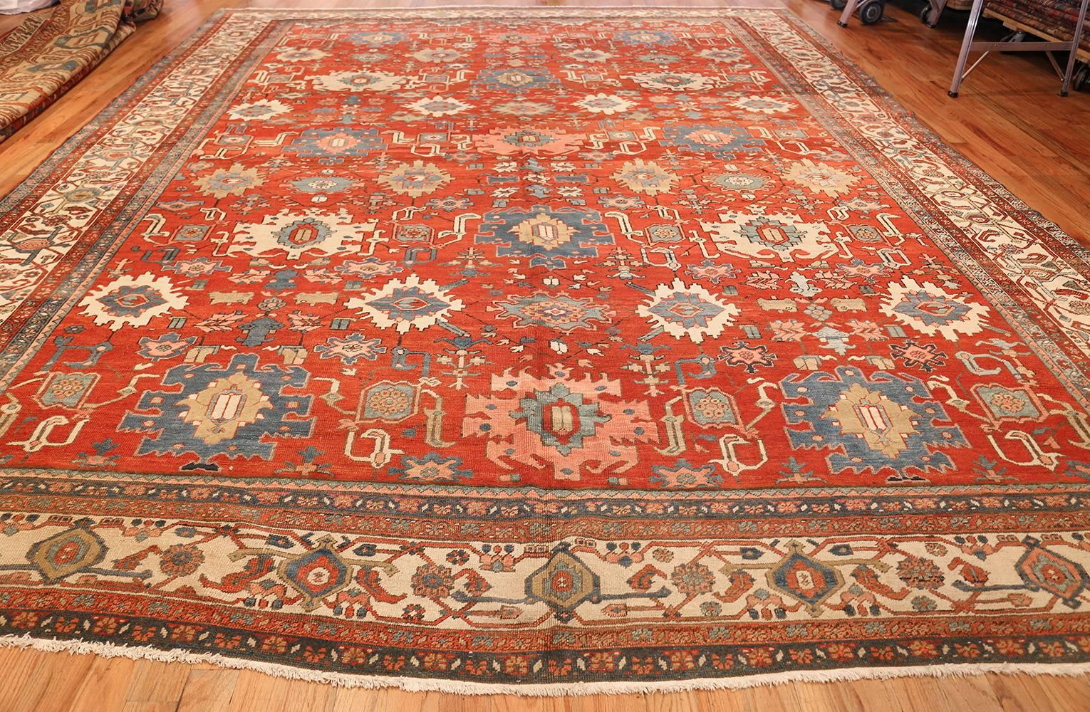 Beautiful red background antique red room size Persian Bakshaish rug, country of origin / rug type: Persian rug, circa date: 1880 – true to the traditional style of many beautiful antique Persian Bakshaish rugs, this masterpiece showcases angular