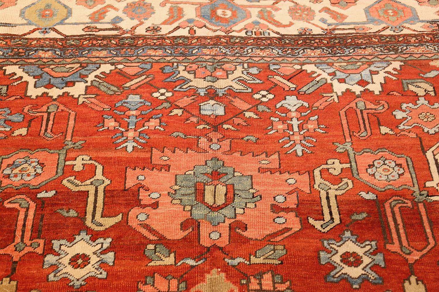Hand-Knotted Antique Red Background Room Size Persian Bakshaish Rug