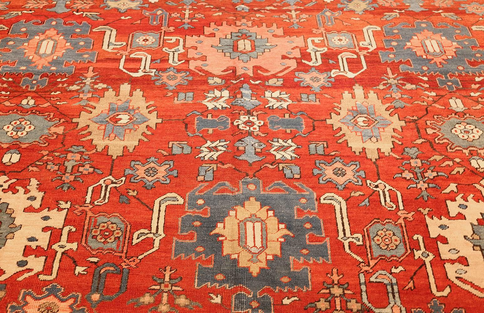 20th Century Antique Red Background Room Size Persian Bakshaish Rug