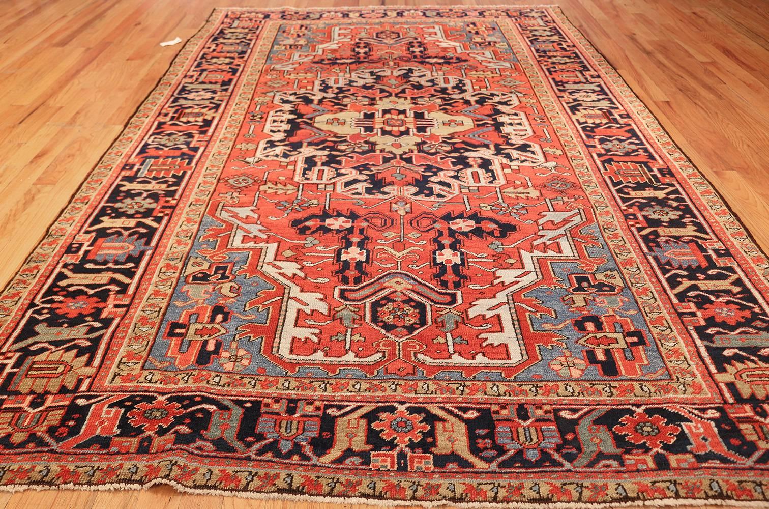 Hand-Knotted Antique Red Background Heriz Persian Rug. Size: 7 ft 2 in x 10 ft 10 in 
