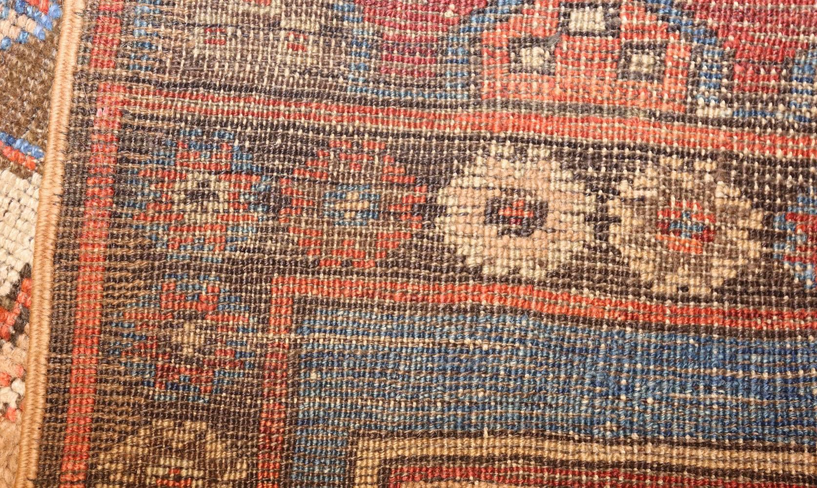 Despite its relative small size, this Karapinar beautifully exhibits noteworthy tribal elements in its borders, its field, and its eccentric medallion, offering a series of delights.

Beautiful small scatter size tribal antique Turkish Karapinar