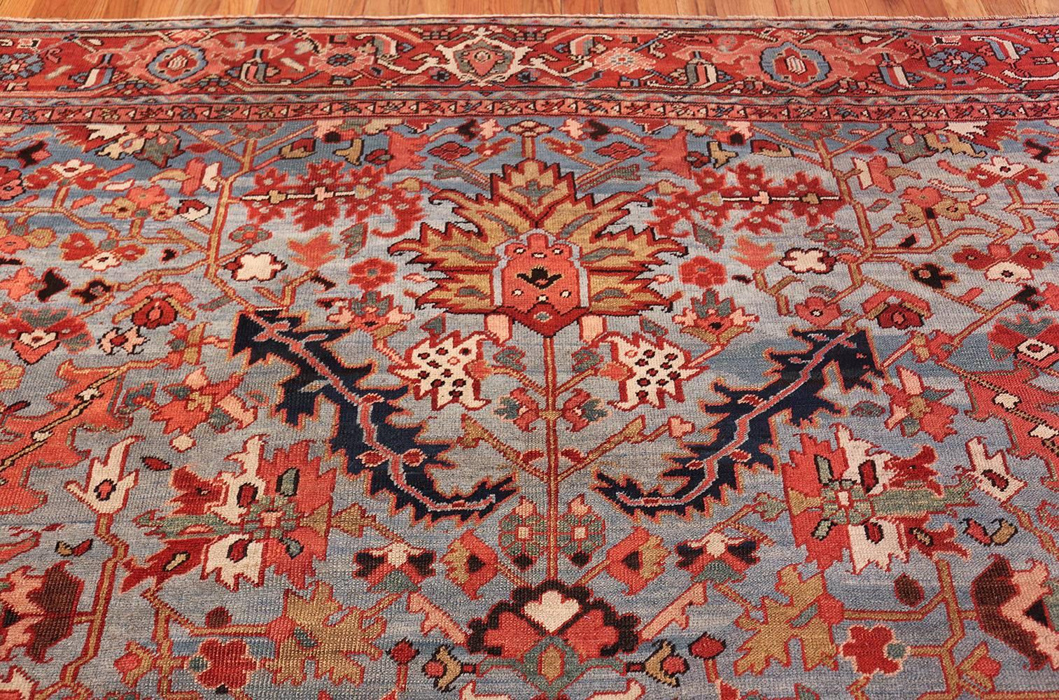 Magnificent antique blue background Heriz Persian rug 49374, country of origin / rug type: Persian rug, date circa 1900s. Some works of art are meant to soothe the spirit and calm the nerves, others are meant to dazzle the mind and engulf the soul