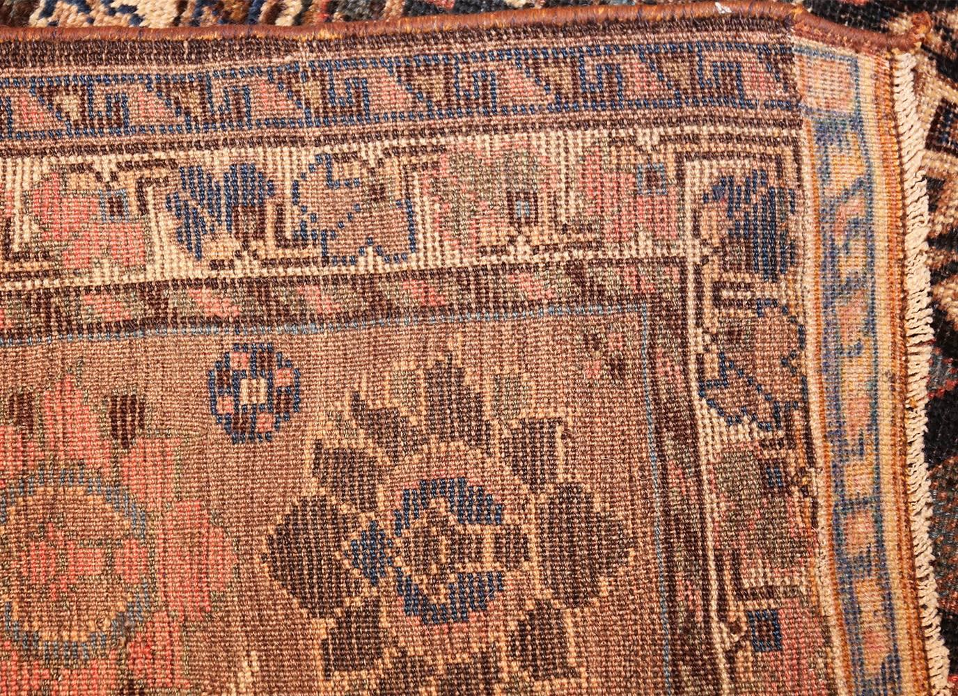 Antique Persian Qashqai Gallery Size Rug, Country of Origin: Persia, Circa Date: Turn of the Twentieth Century – Size: 7 ft x 16 ft 8 in (2.13 m x 5.08 m)

This gallery size antique tribal and primitive design Persian Qashqai rug is meant to be